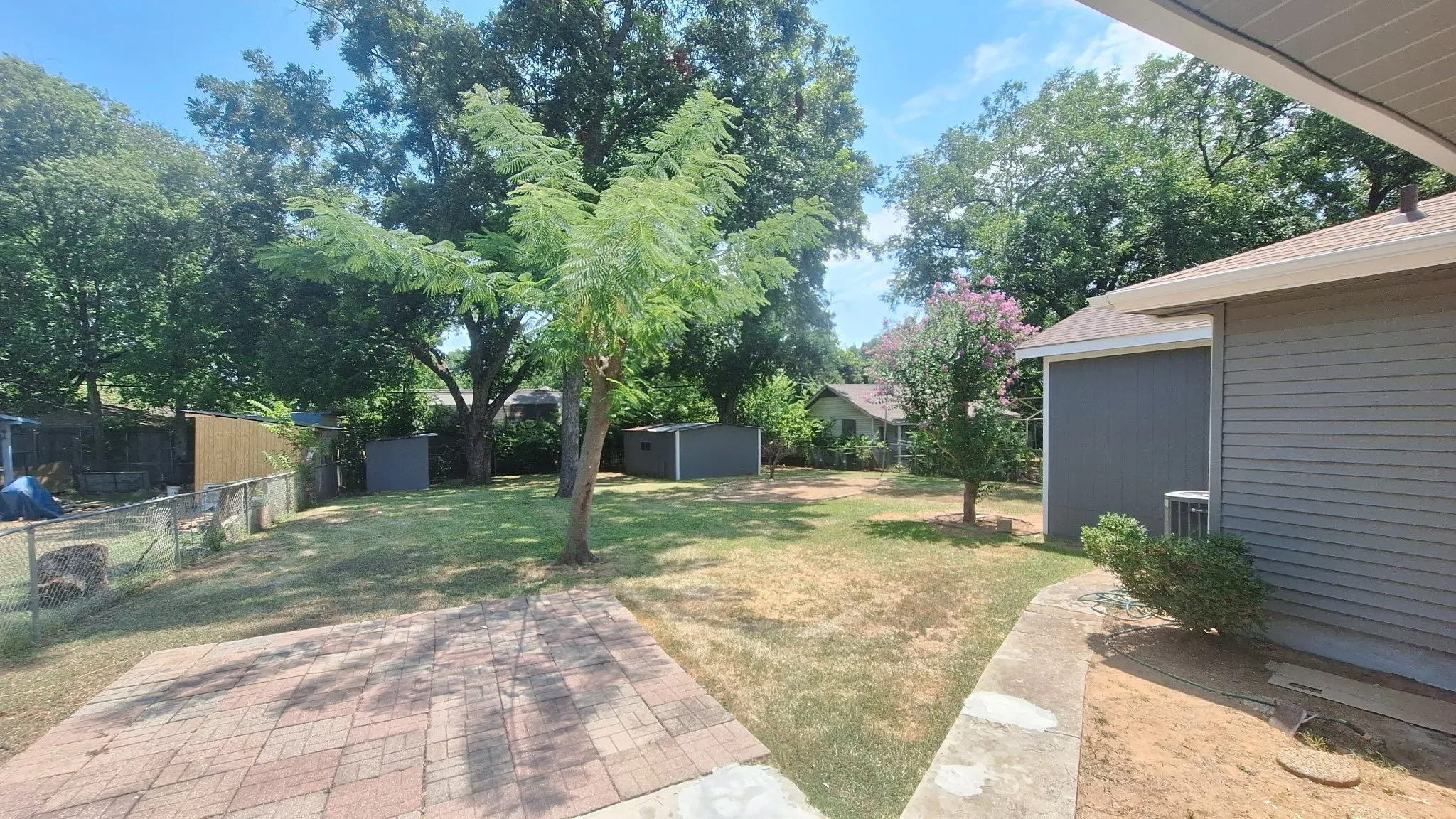 view of backyard from covered back porch