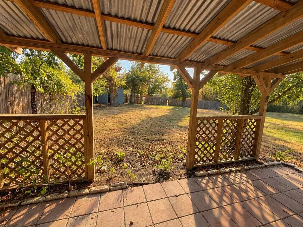 Enjoy the scale of the property and mature trees from this sheltered outdoor space.