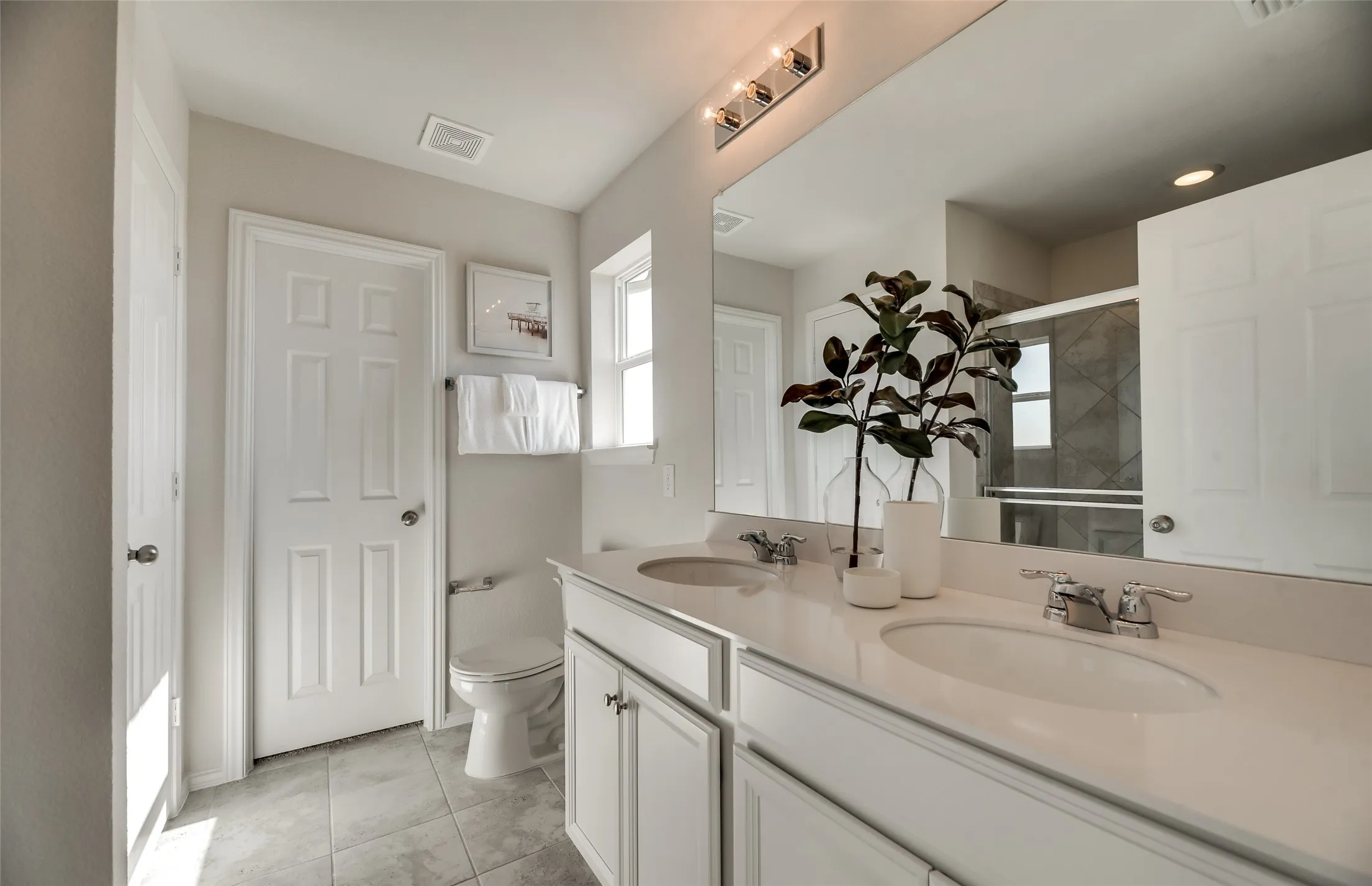 *Model Representation - Owner's private bath with double vanity