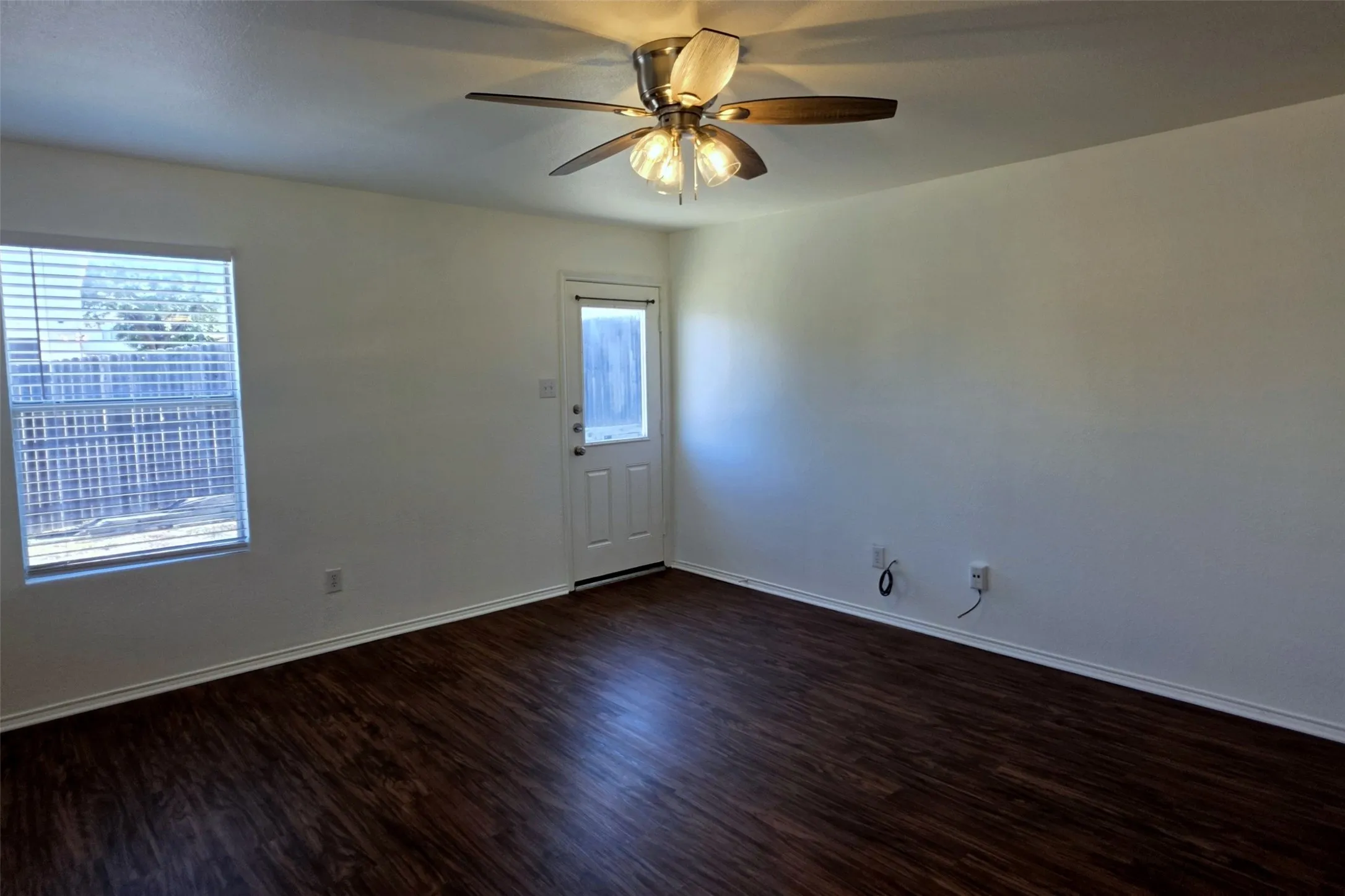 Rear door leads to the backyard.