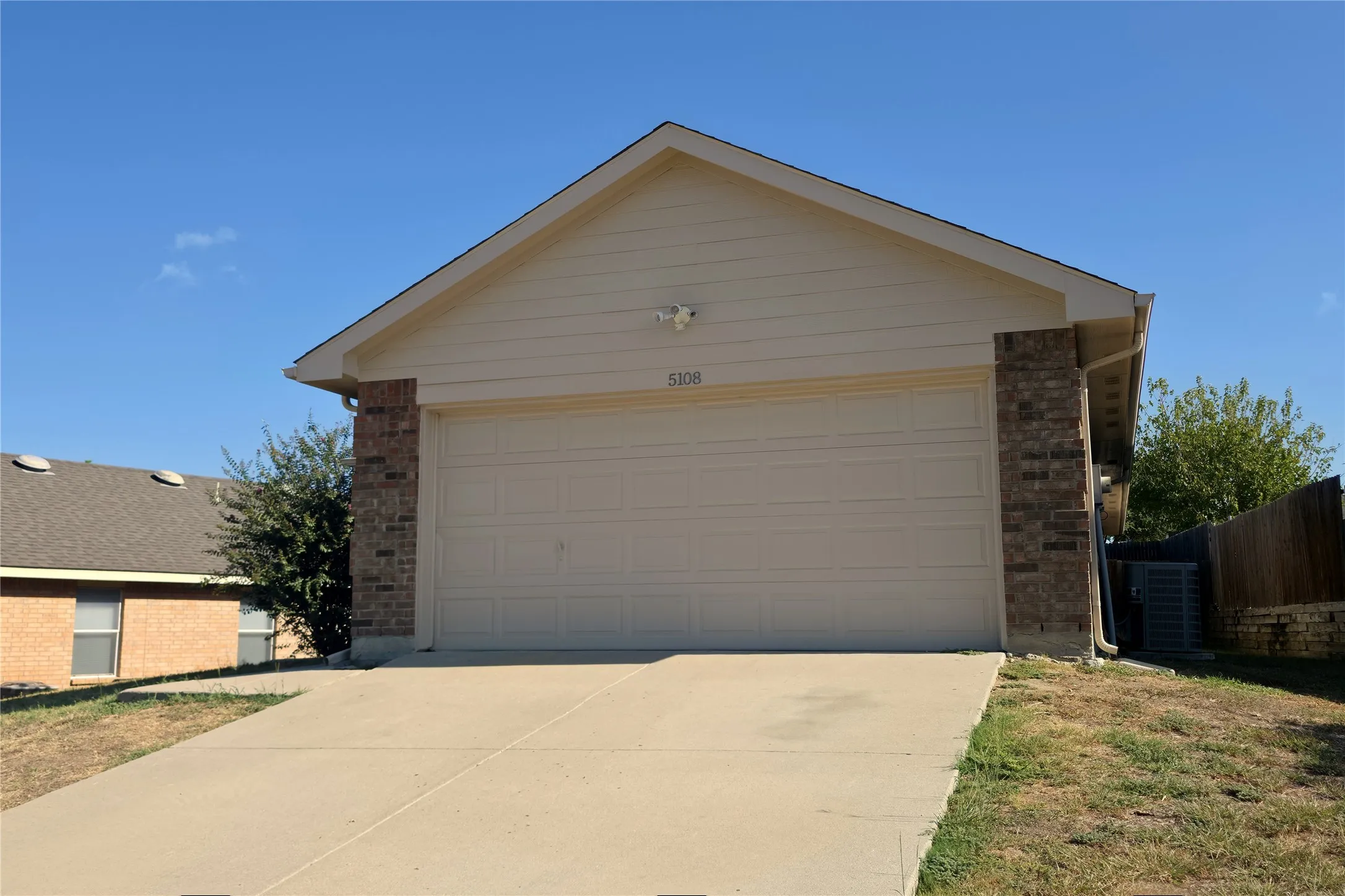 Plenty of parking on this extra-long driveway--plus a two-car garage!
