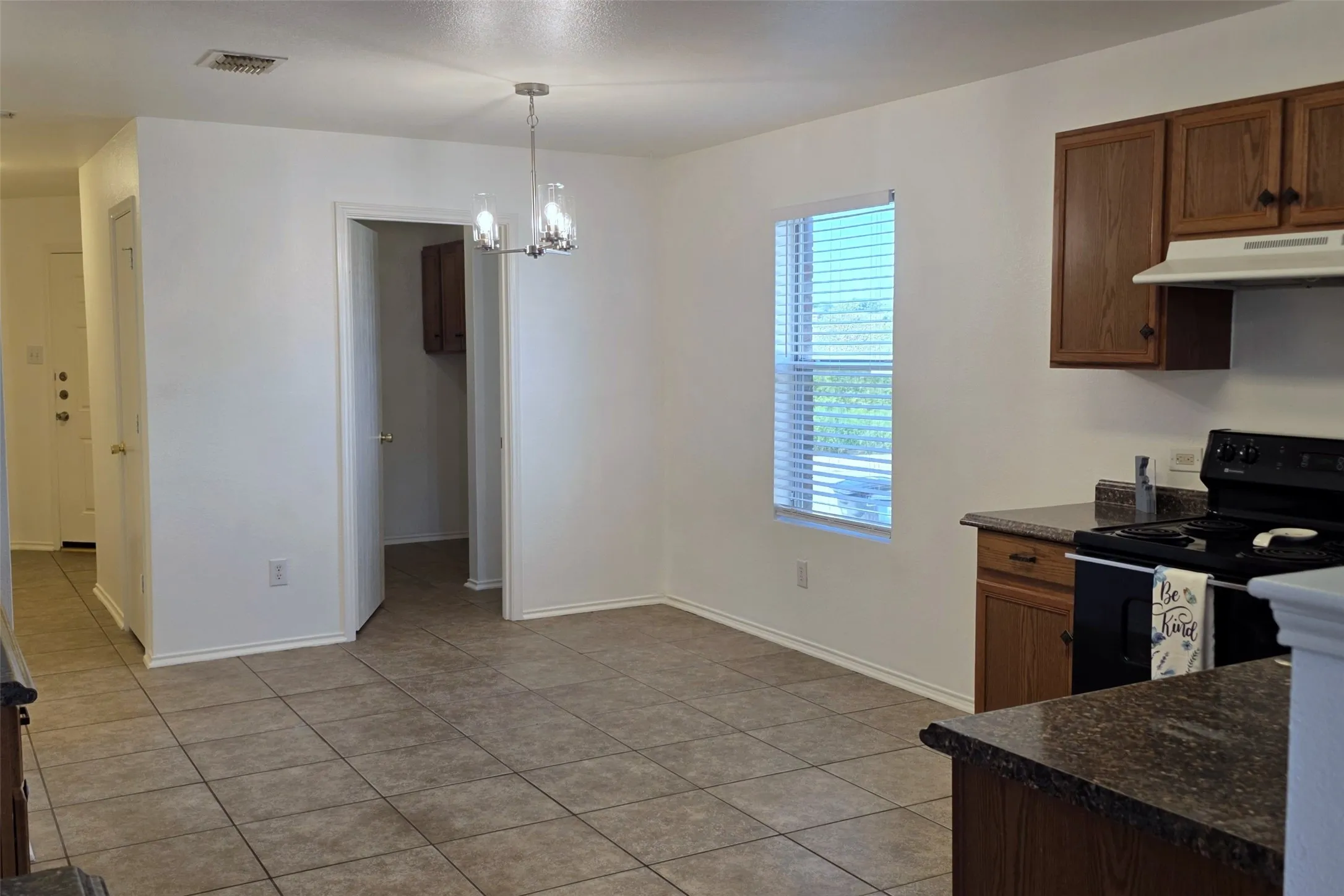 Dining nook has a view of the park across the street!