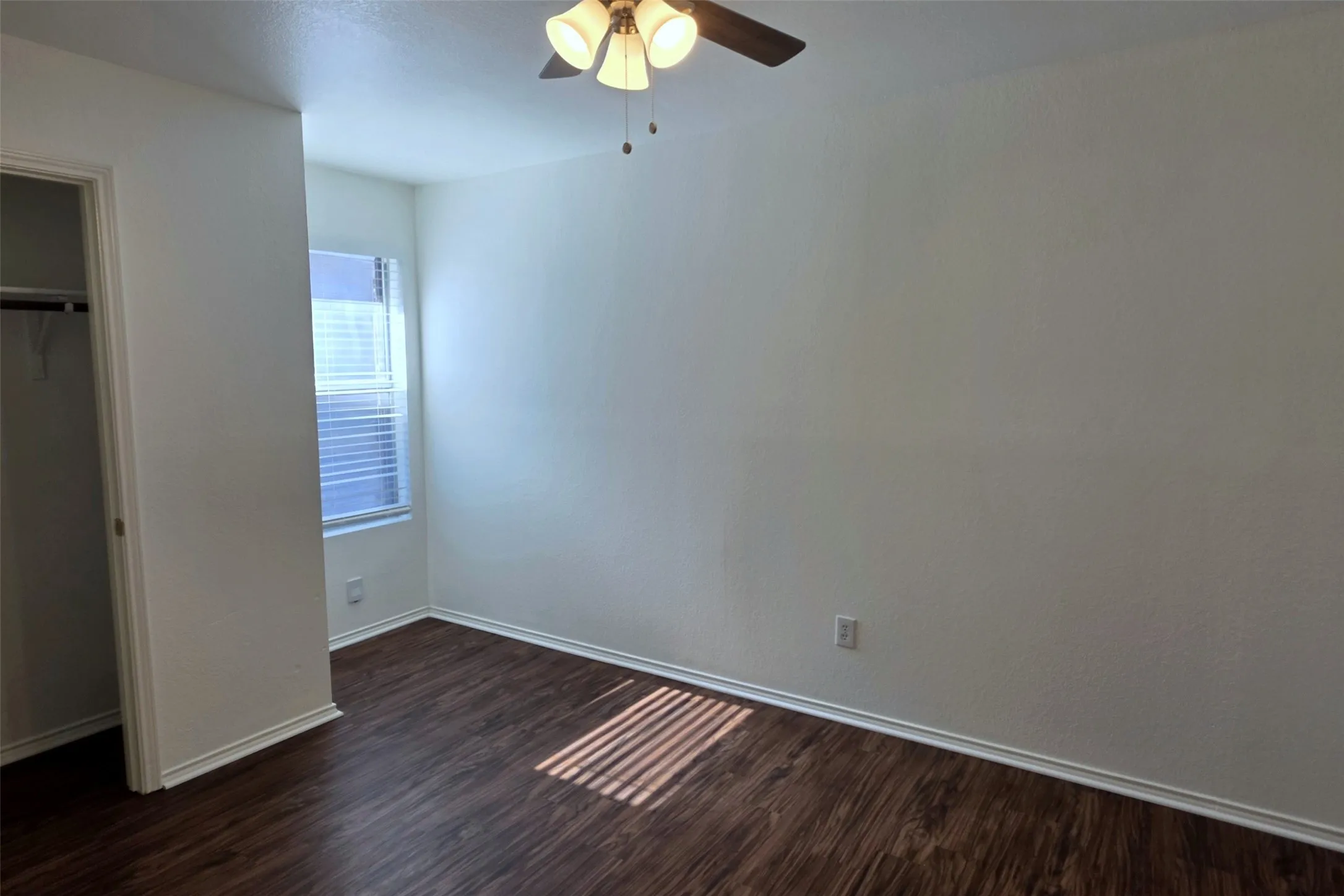New window blinds, new flooring and new ceiling fan in Bedroom 2!
