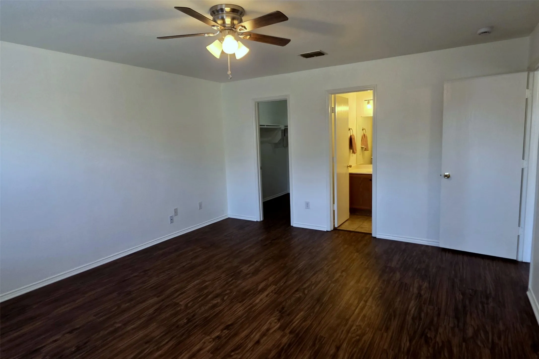 Primary suite has a walk-in closet separate from its ensuite bathroom!