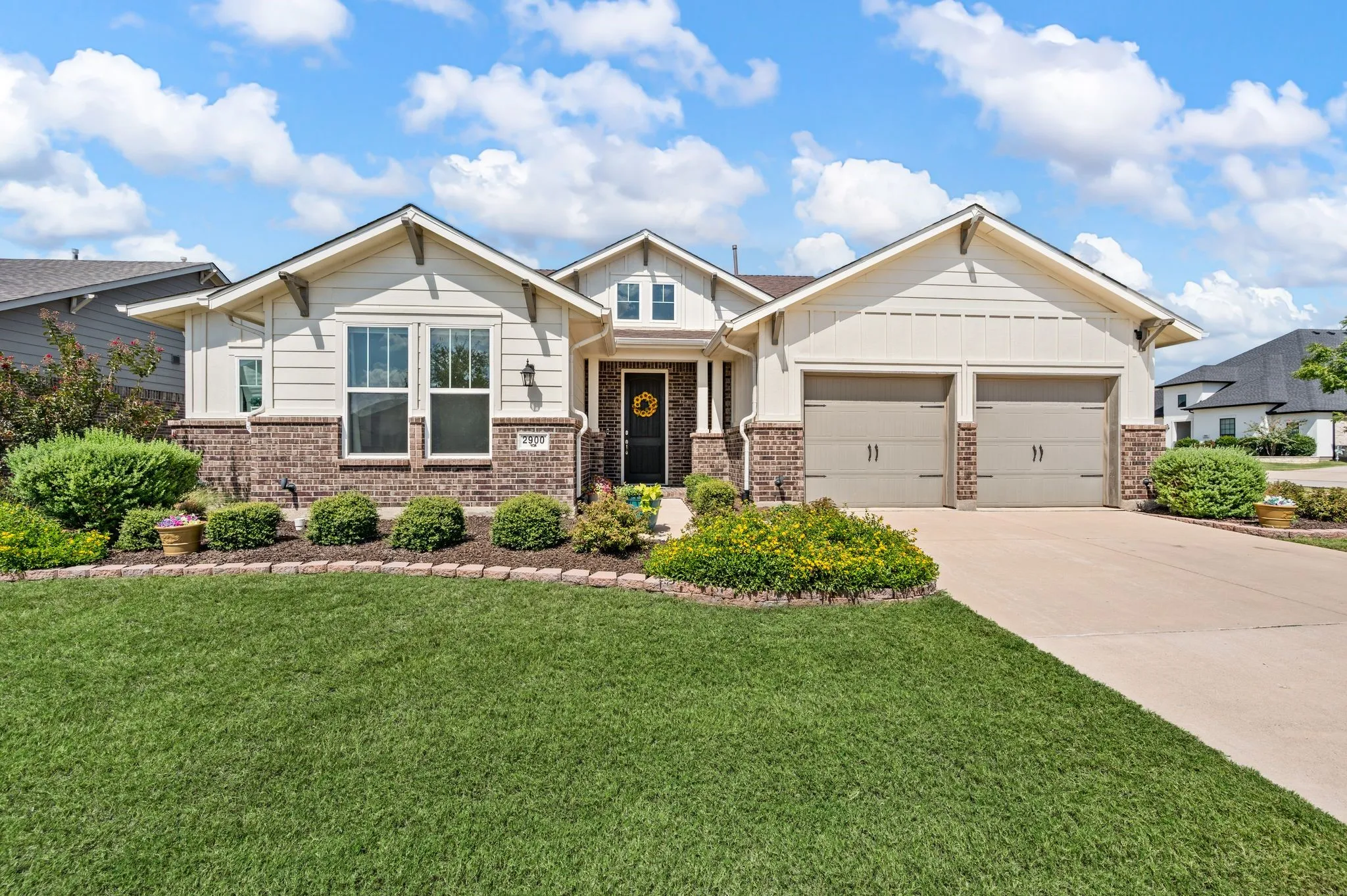 Welcome Home! You will enjoy pulling up to this beautifully landscaped home on Peekaboo Lane!