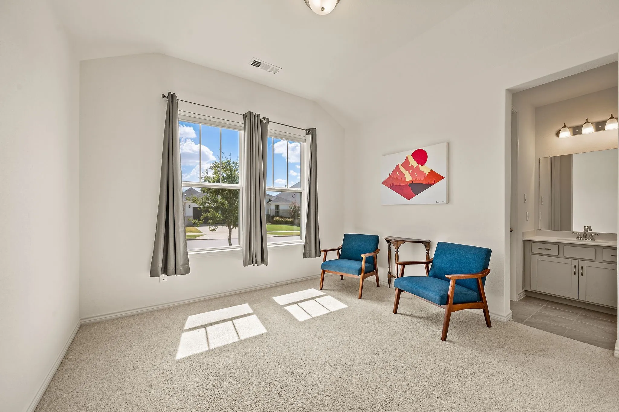 One of Guest bedroom with wonderful natural light attached to a Jack and Jill bathroom!
