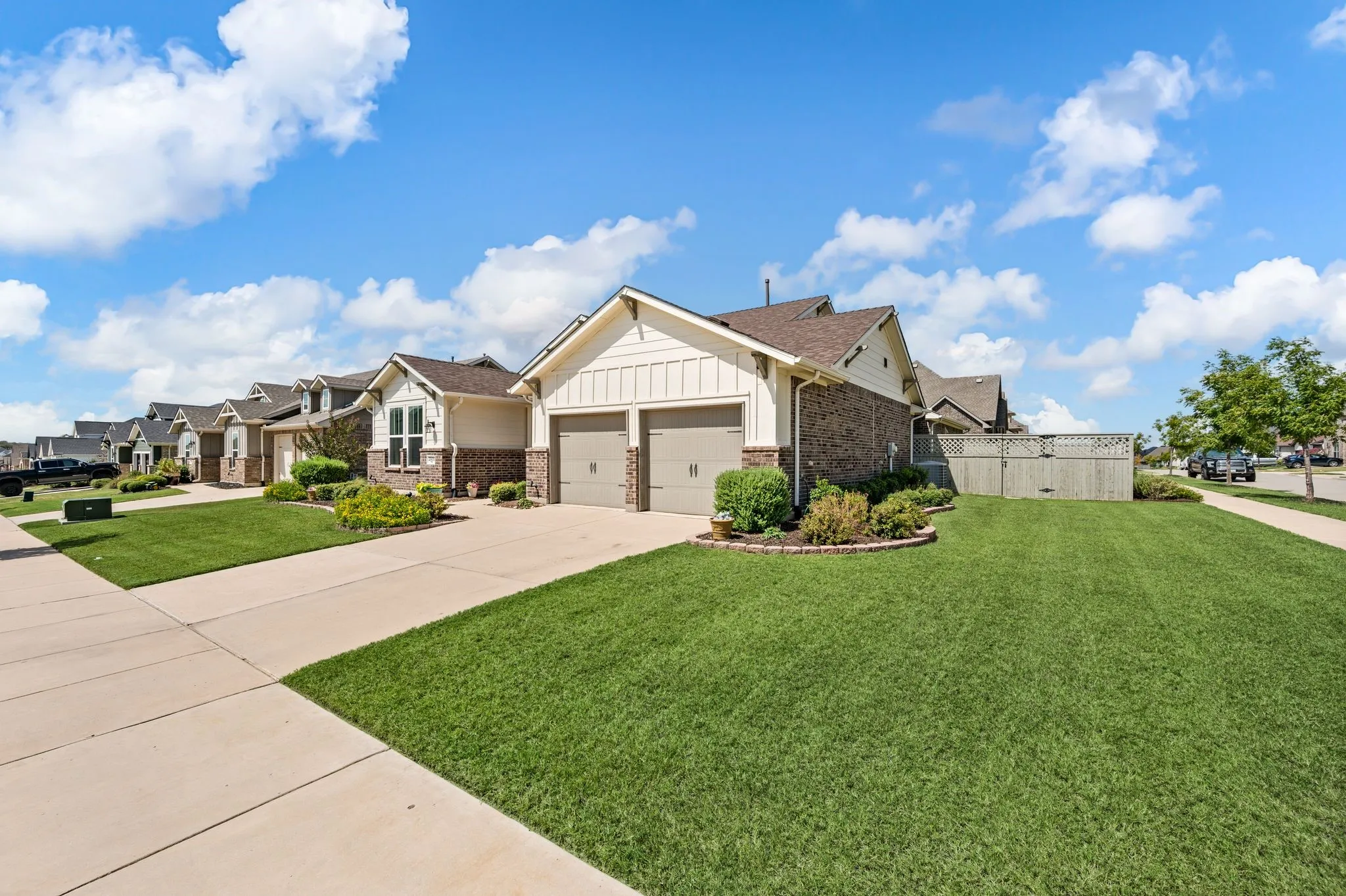Amazing home featuring a three-car tandum garage, corner and landscaped front yard and a great place to come home to!