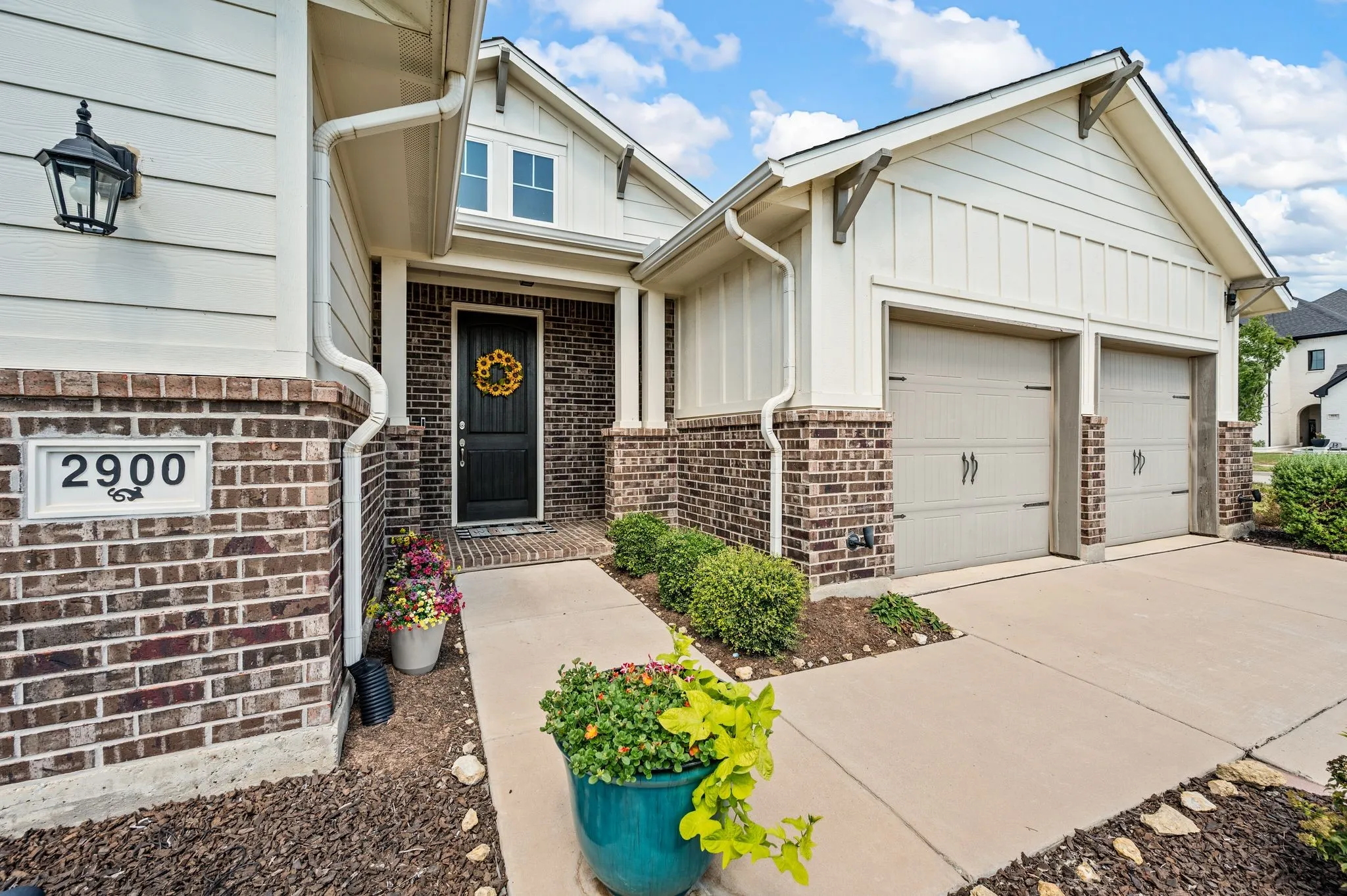 What a wonderful porch to welcome your friends and family!