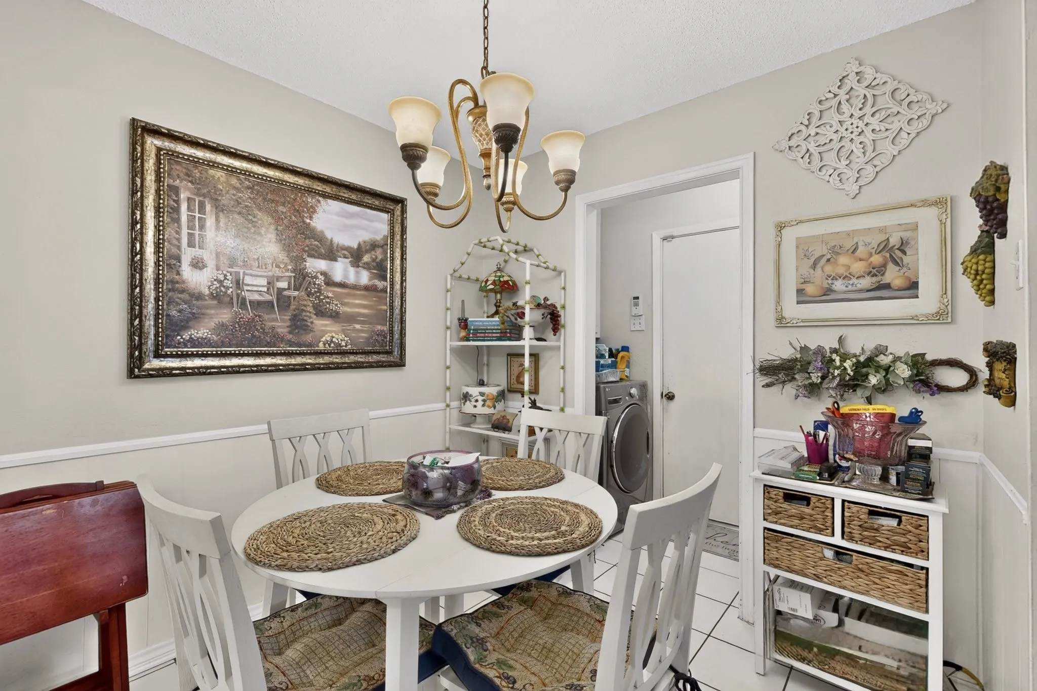 Warm interior space with neutral wall tones and white wainscoting