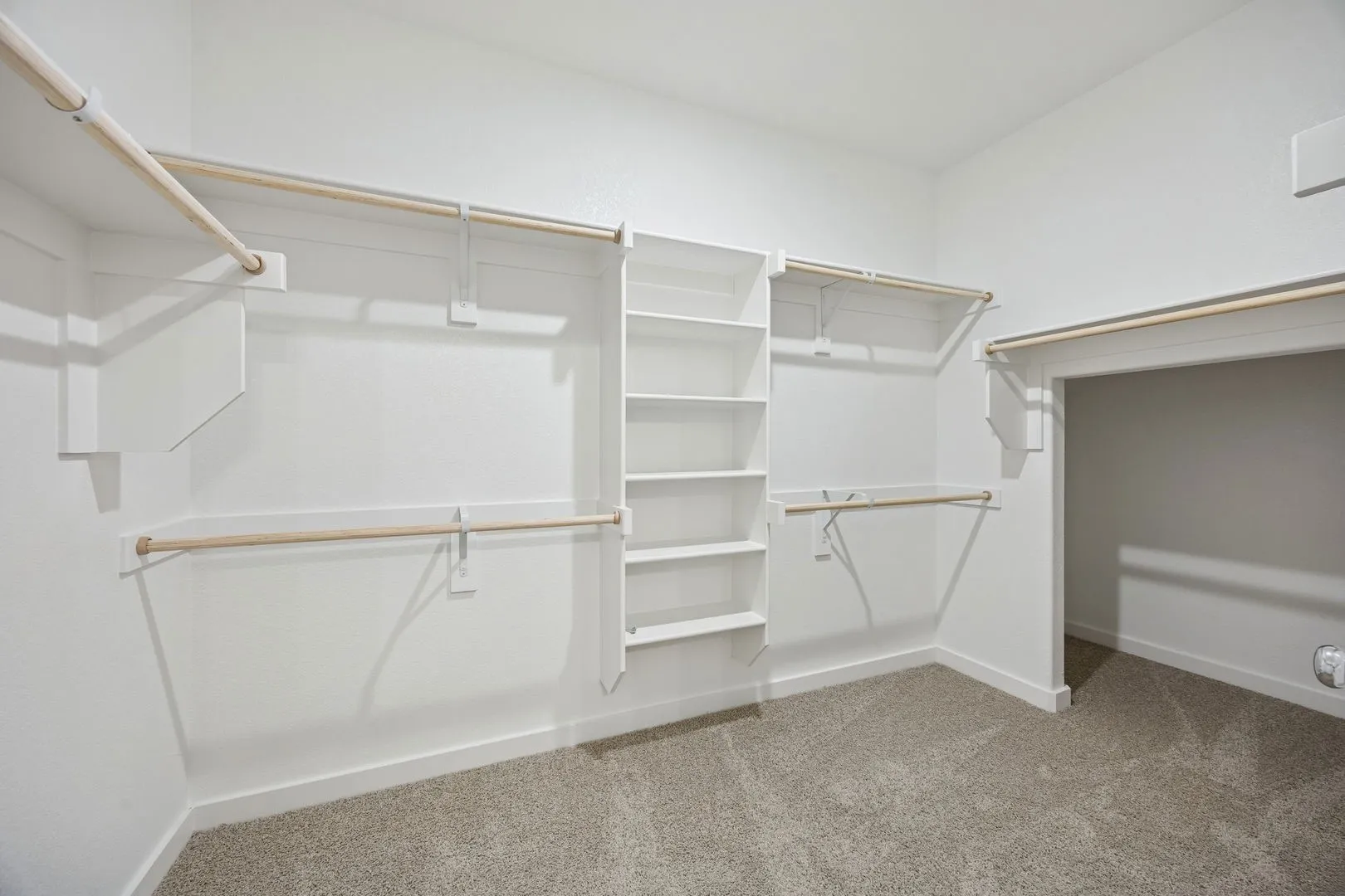 Primary Closet in the Stanley II home plan by Trophy Signature Homes – REPRESENTATIVE PHOTO