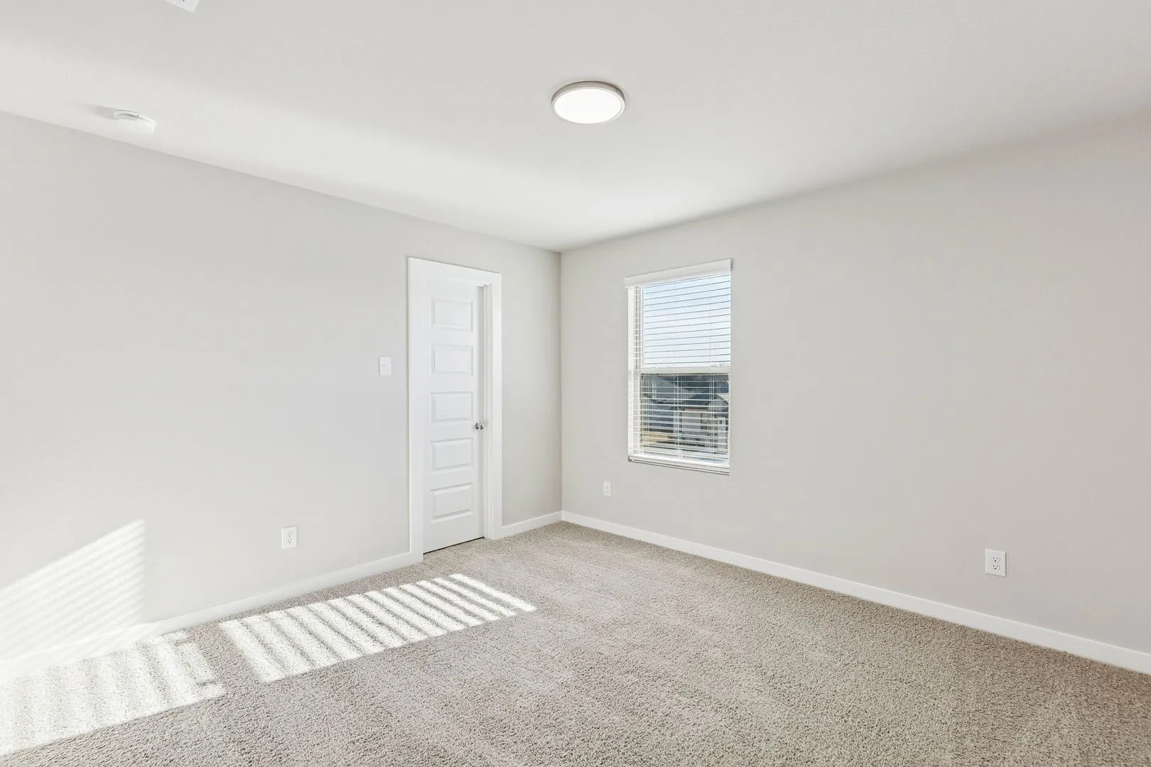 Bedroom in the Haylee home plan by Trophy Signature Homes - REPRESENTATIVE PHOTO