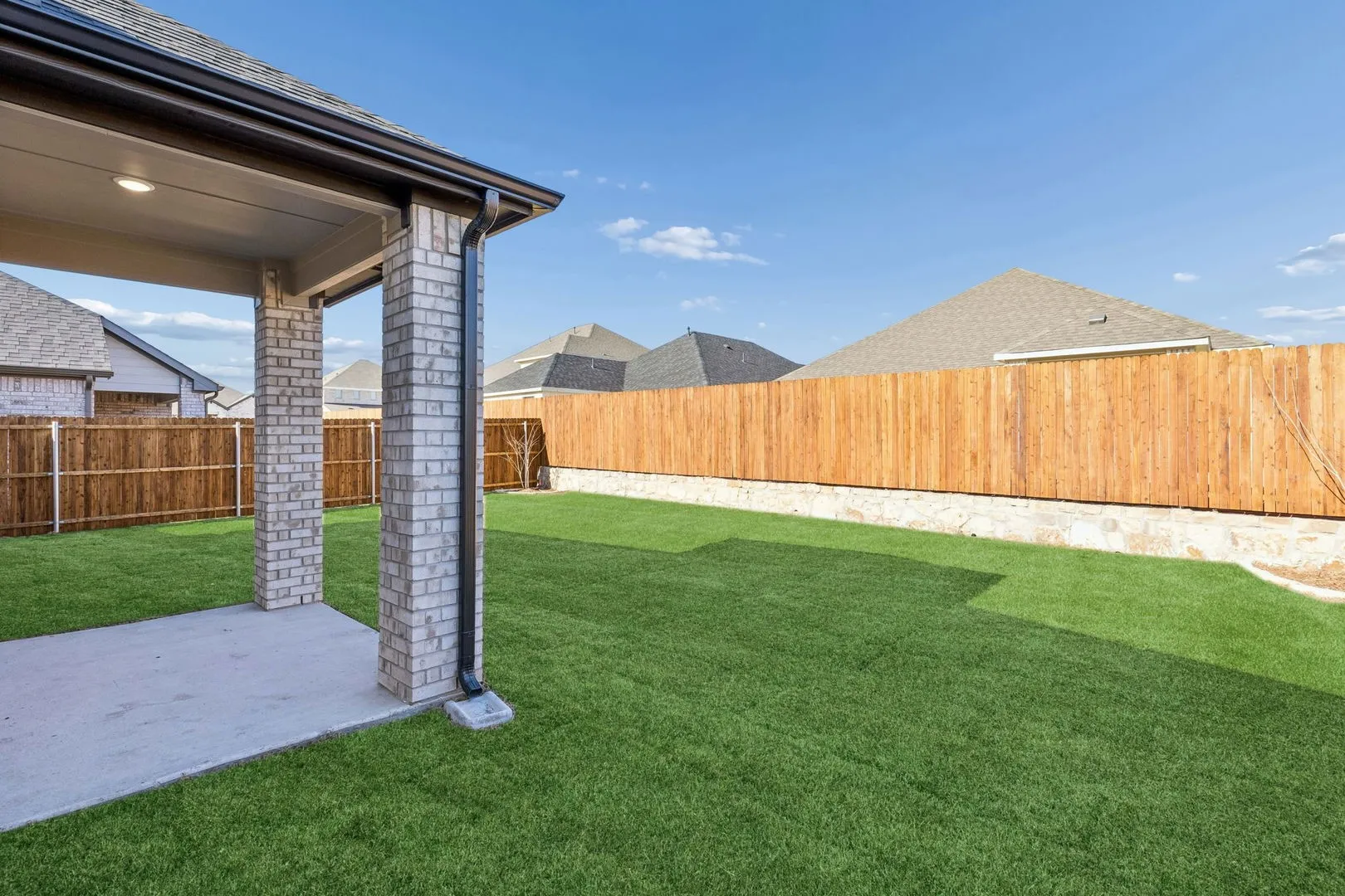 Covered Patio in the Haylee home plan by Trophy Signature Homes - REPRESENTATIVE PHOTO