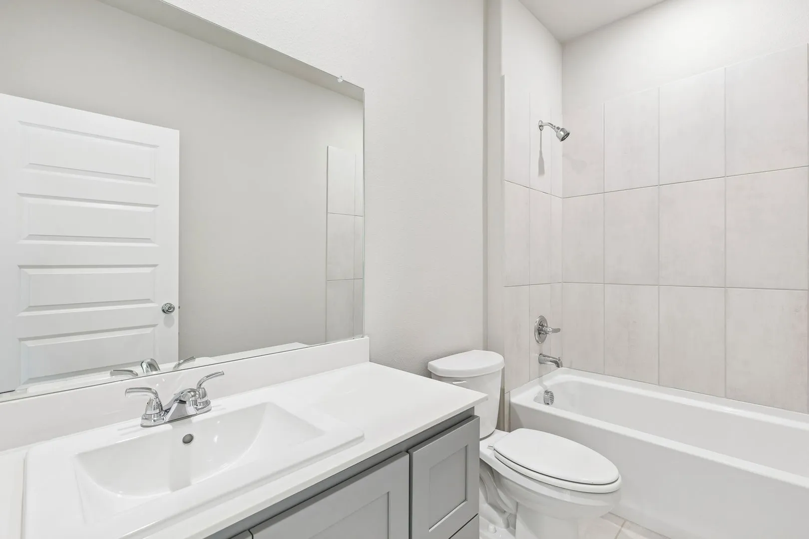 Bathroom in the Haylee home plan by Trophy Signature Homes - REPRESENTATIVE PHOTO