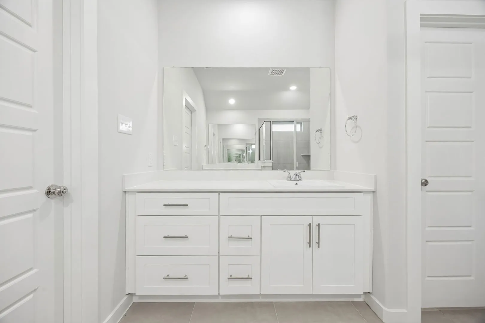 Primary bathroom in the Heisman home plan by Trophy Signature Homes – REPRESENTATIVE PHOTO
