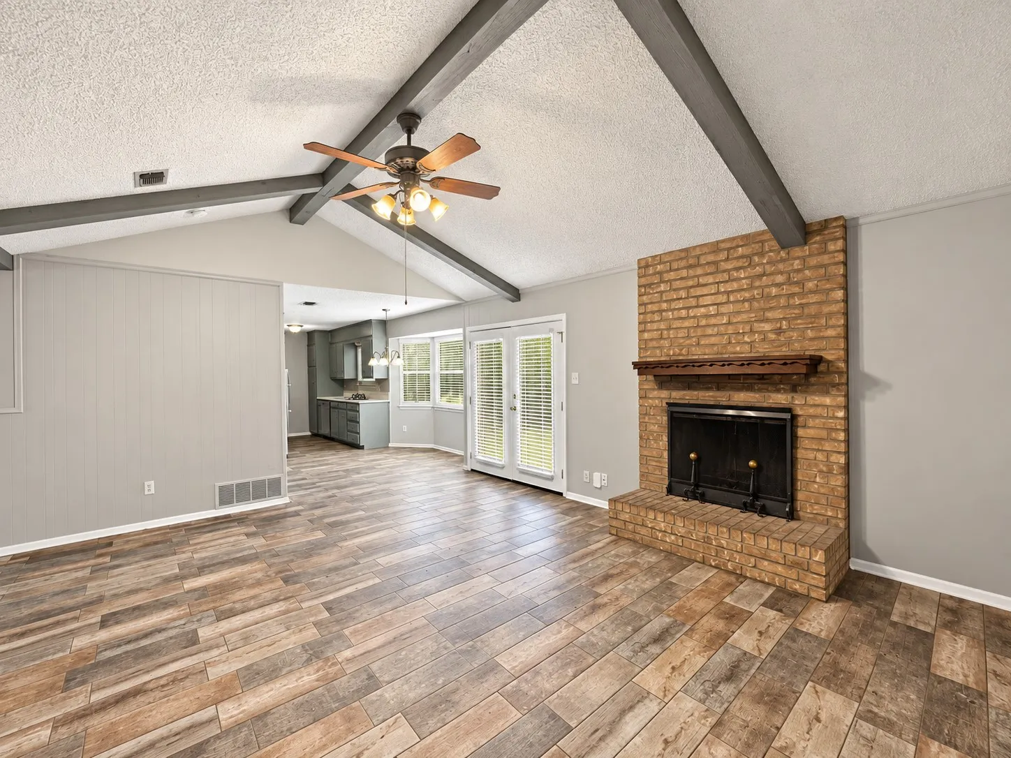 Living room photo shows open style design