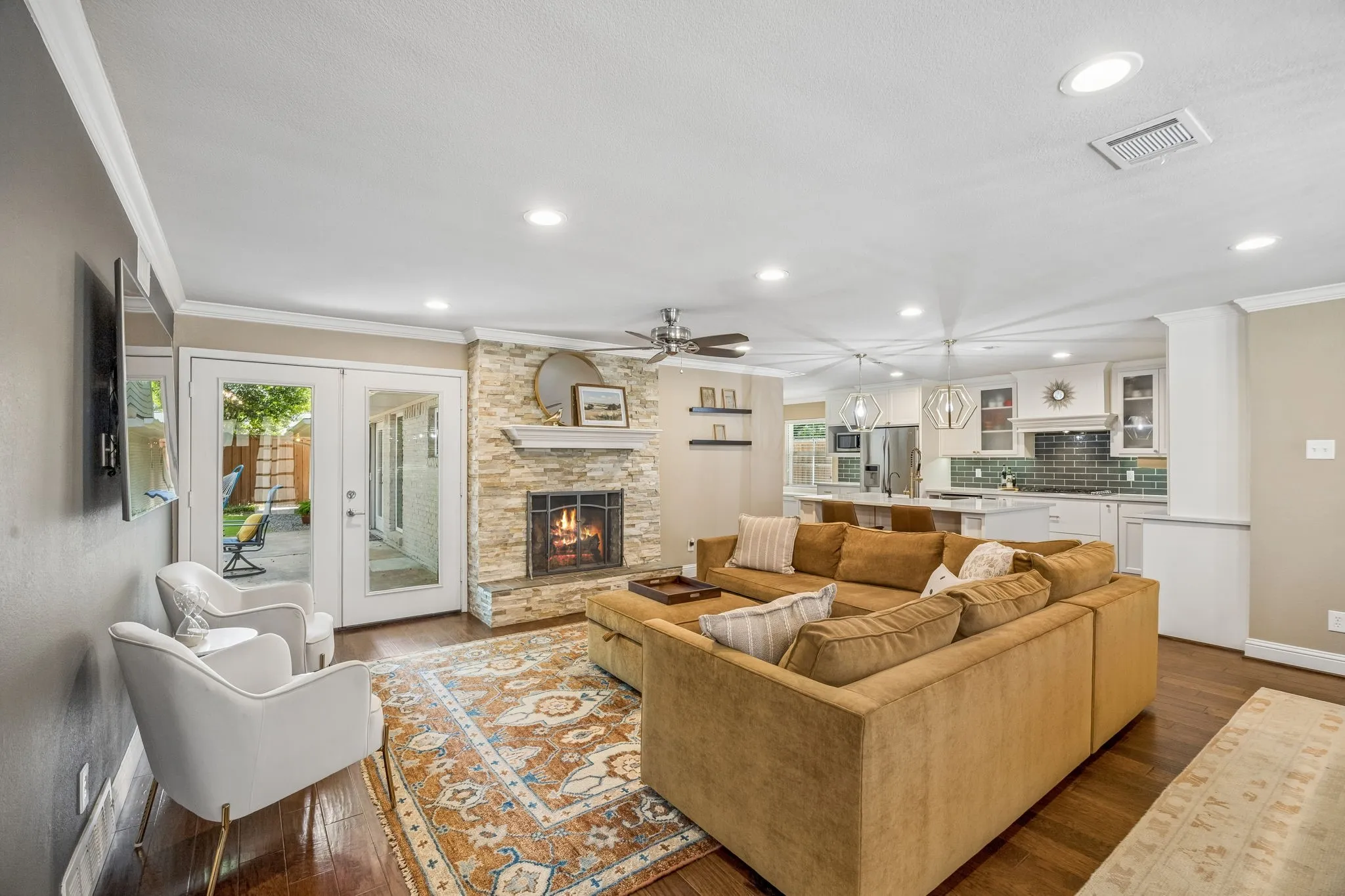 French doors open to large patio