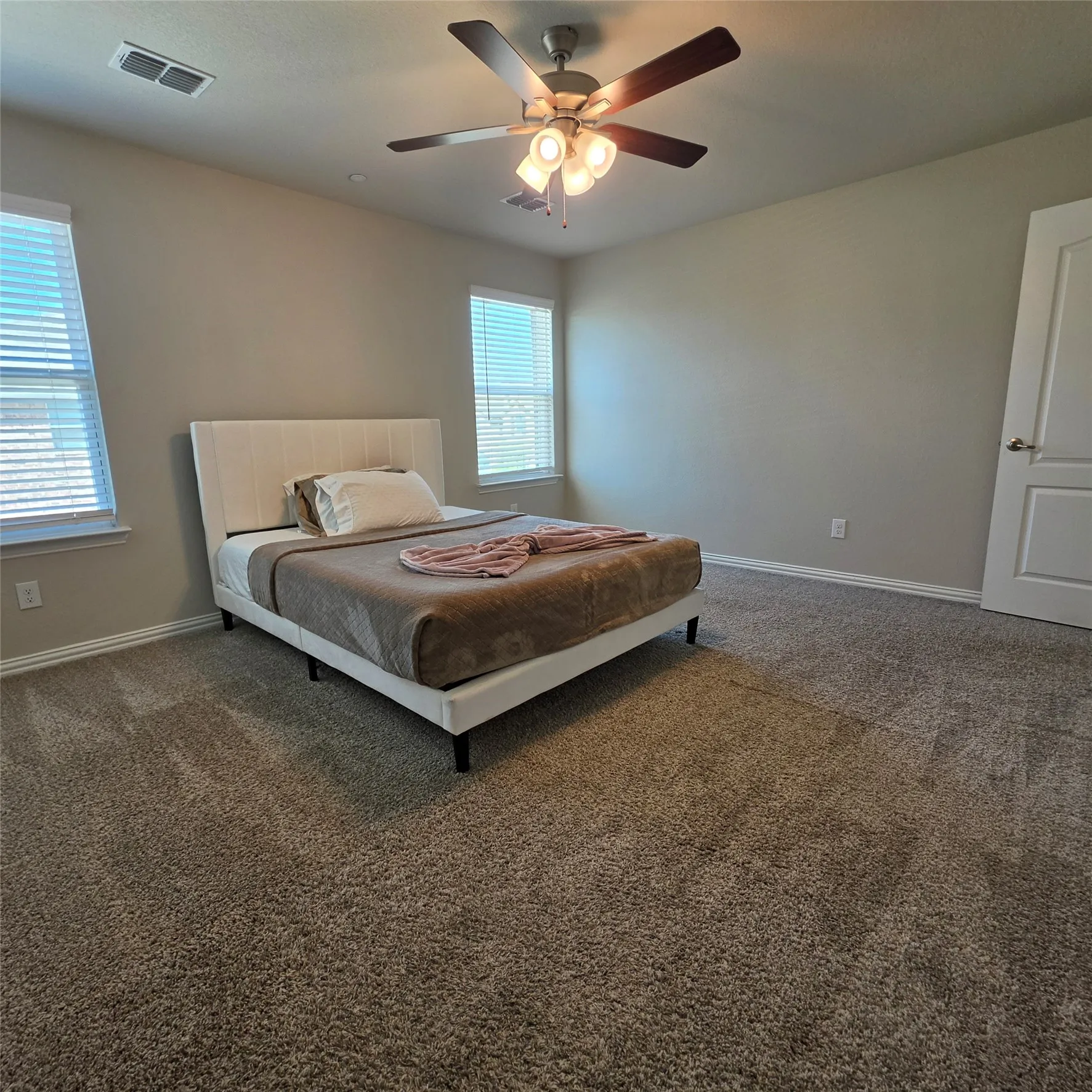 Primary bedroom has 2 walk in closets
