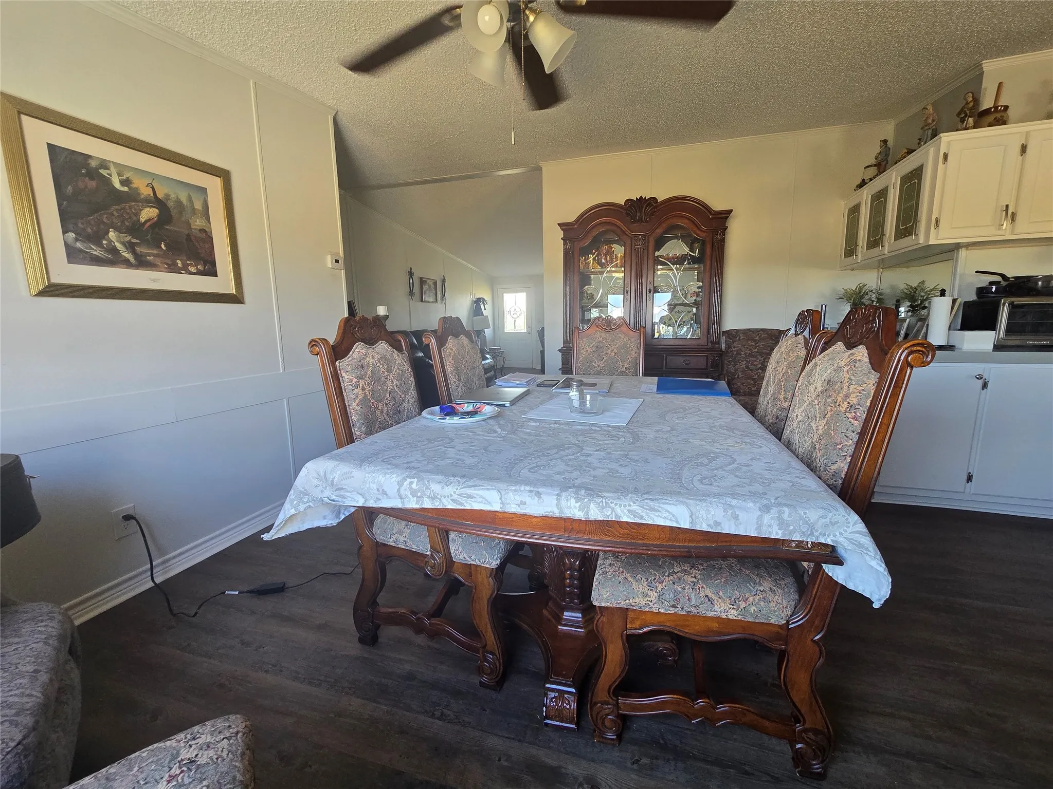 Wood-finish flooring throughout the dining area