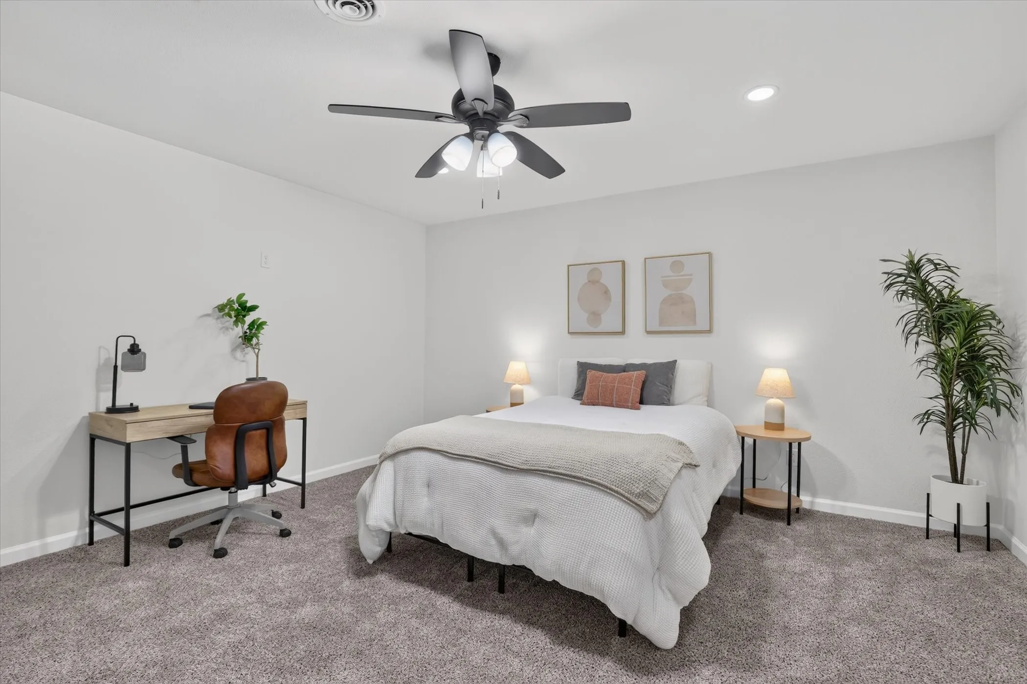 Recessed ceiling lighting, ceiling fan, and gray carpeting