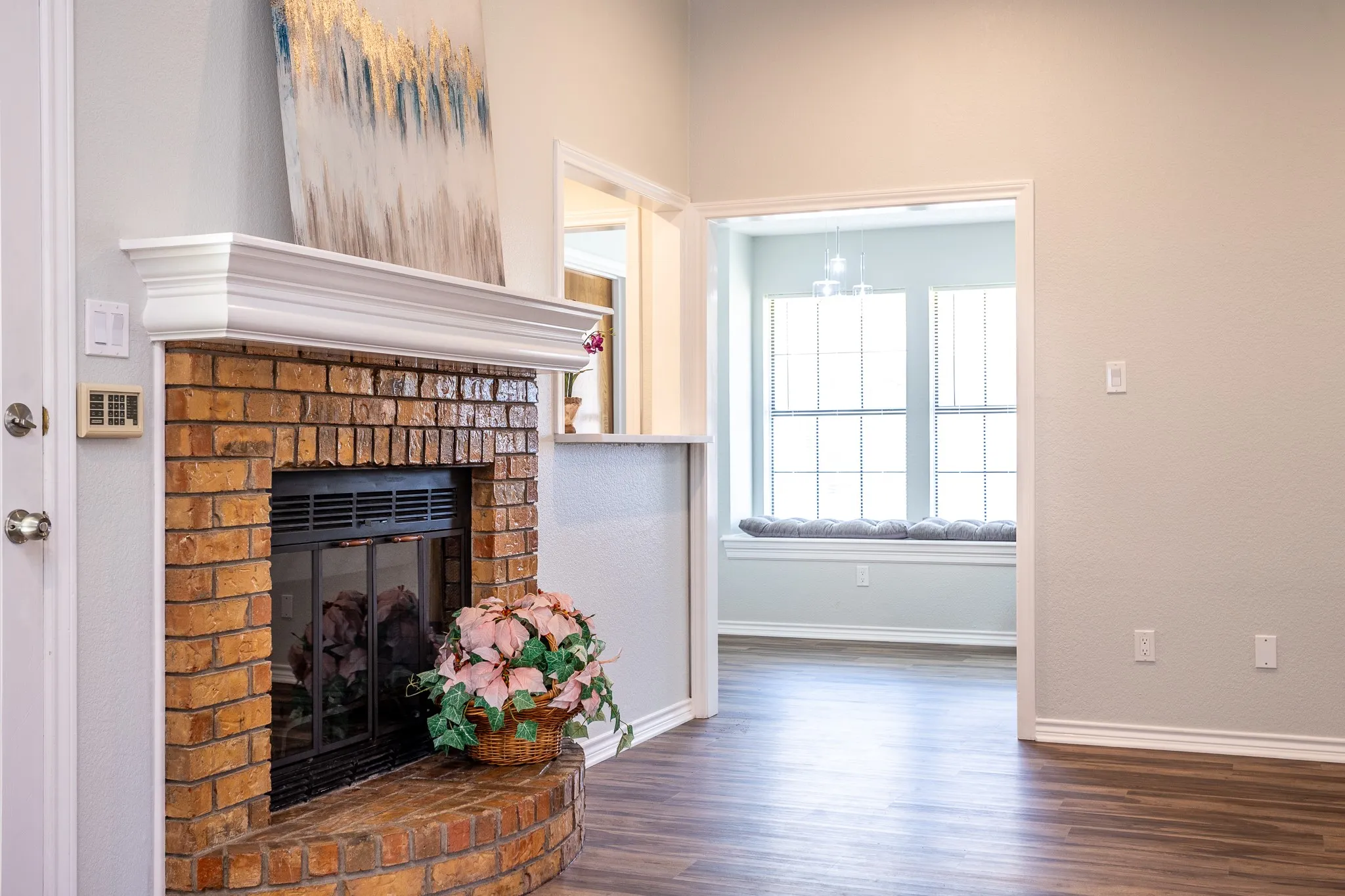 BREAKFAST NOOK IS NEAR WET BAR CREATING AN ENTERTAINMENT CENTER