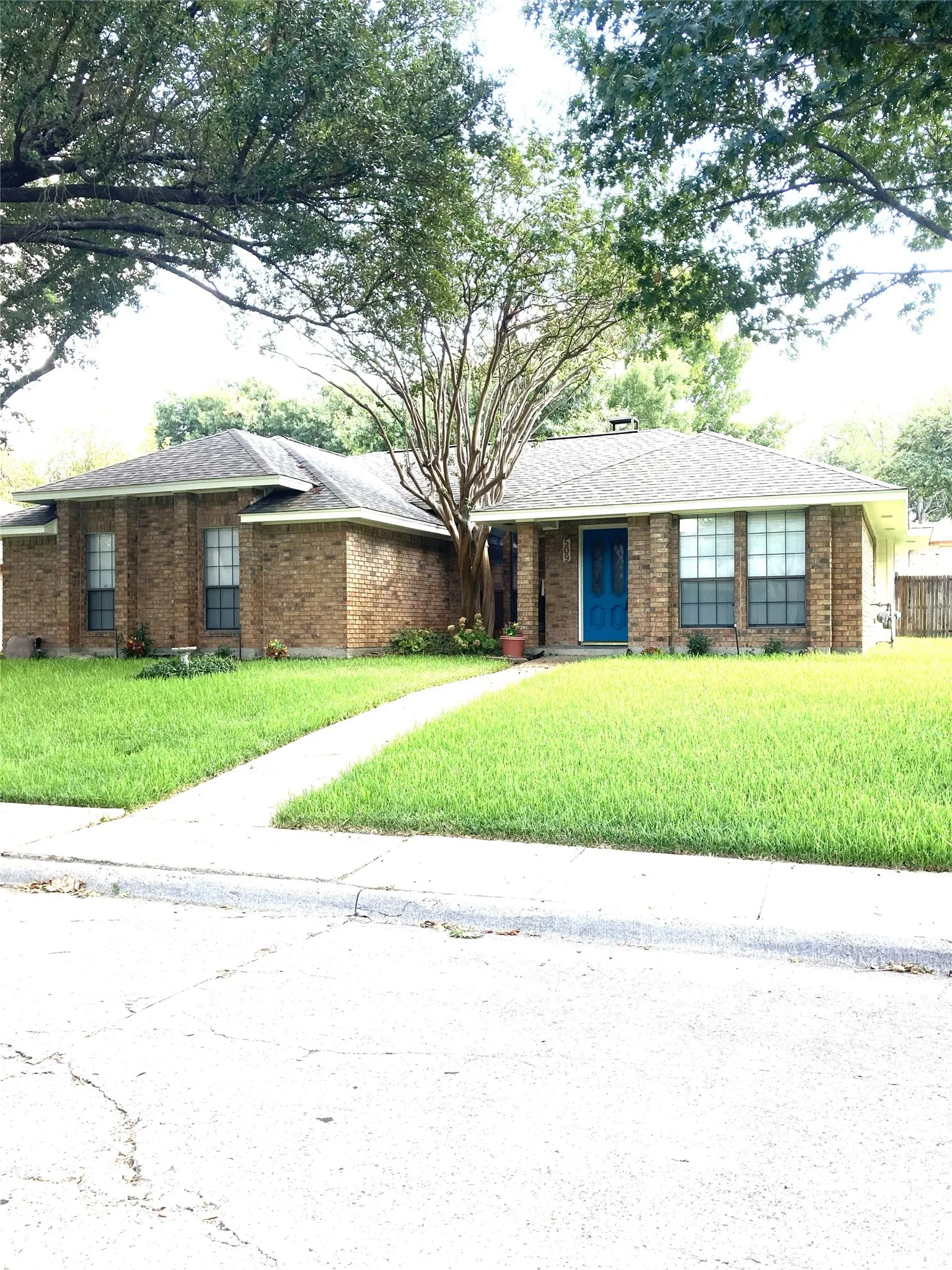 Located in secluded DeSoto neighborhood with curved streets and shade trees.