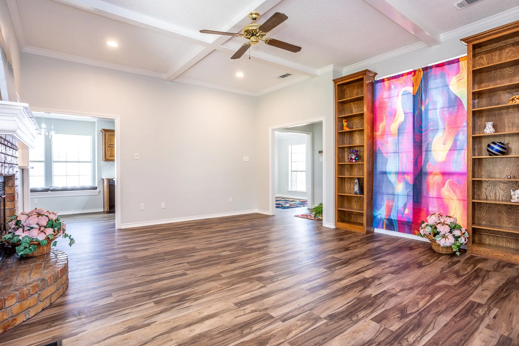 OFF LIVING AREA IS A FORMAL DINING AS WELL AS BREAKFAST NOOK AND KITCHEN