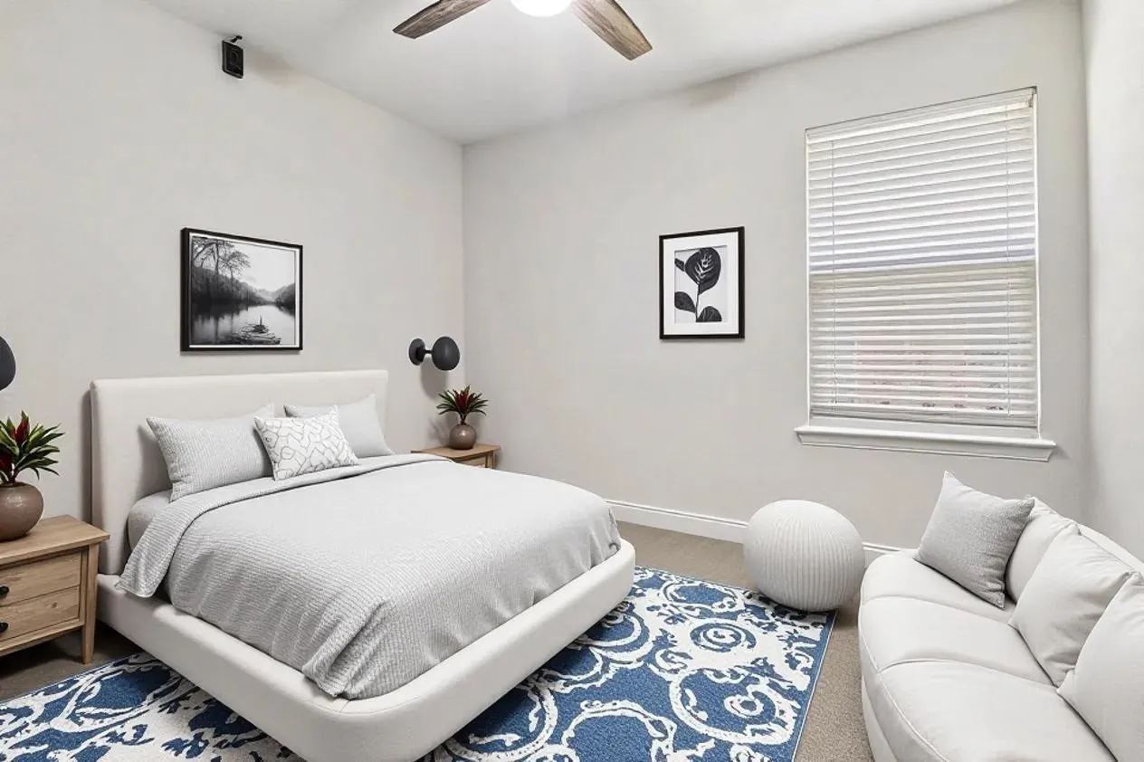 Bedroom 3
Recessed ceiling with a wood-finish ceiling fan, window with blinds, and wall-mounted sconces