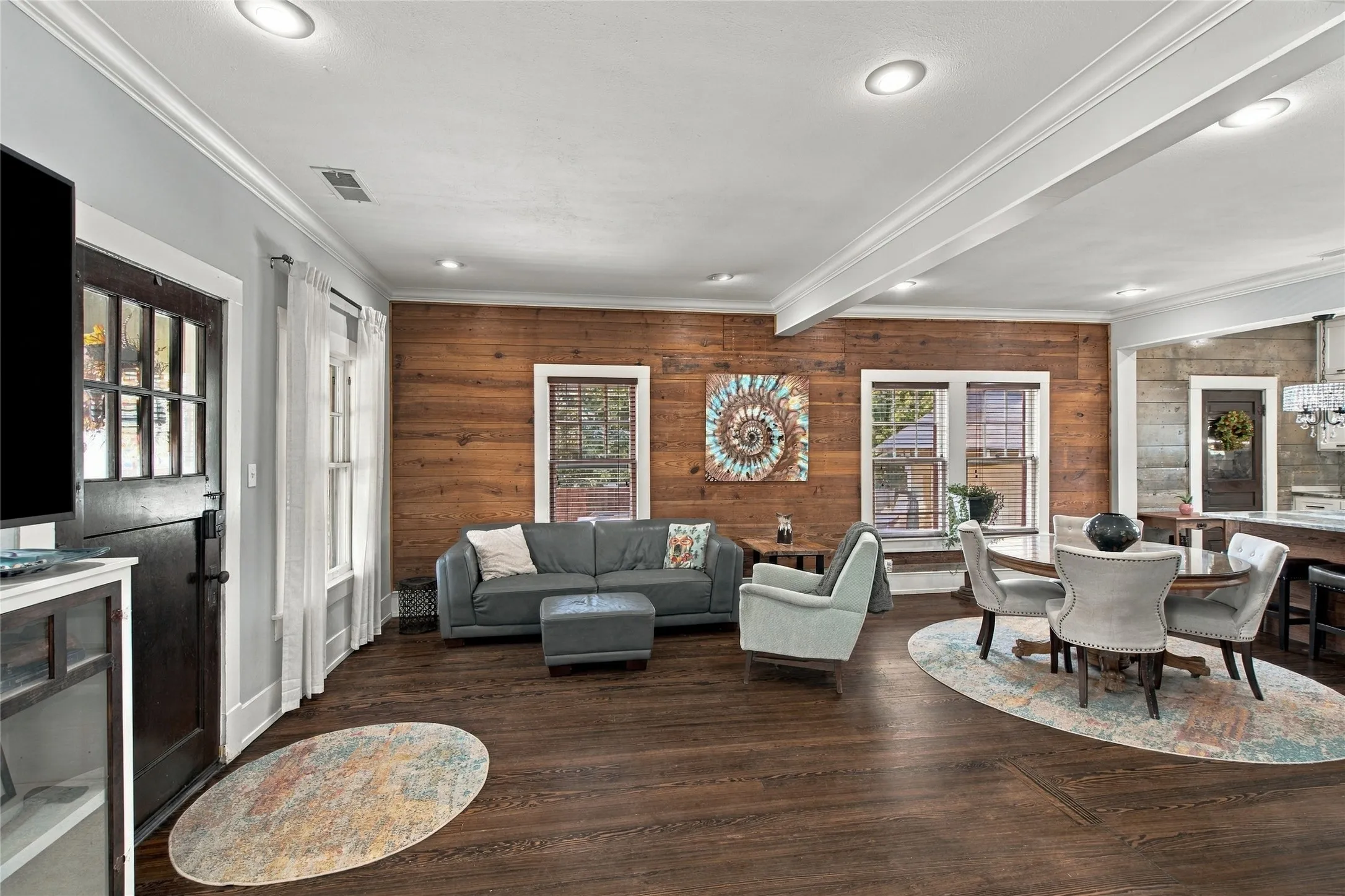 The original interior wood walls of the home were kept and refinished.