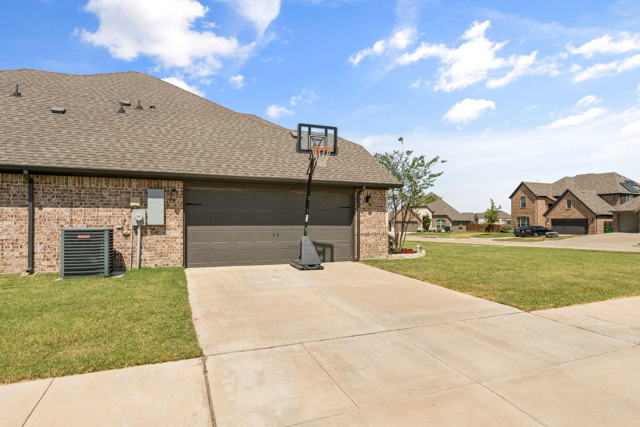 Brick exterior with a shingle roof