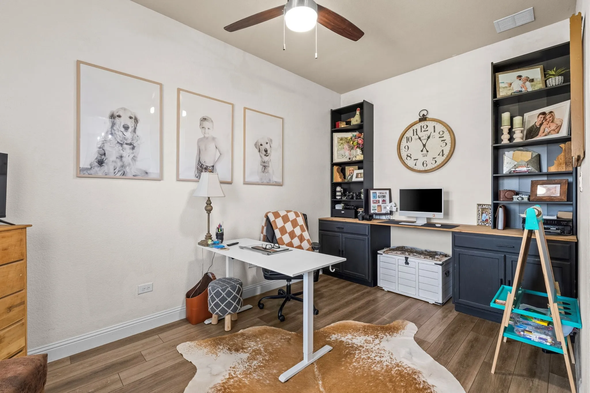 Built-in desk with dual cabinet storage and open shelving