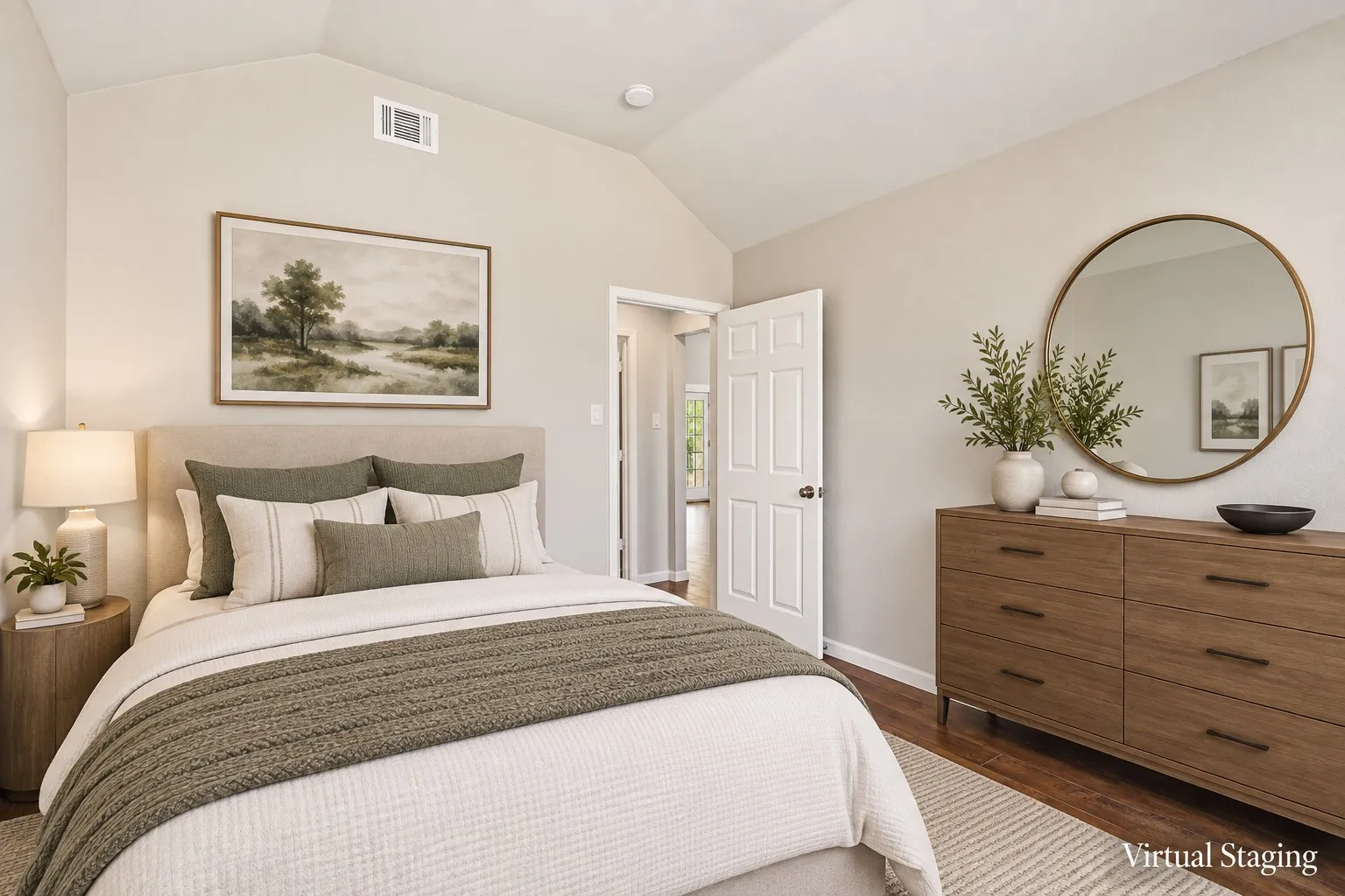 Vaulted ceiling, wood-finish flooring, paneled interior door, and light-toned walls