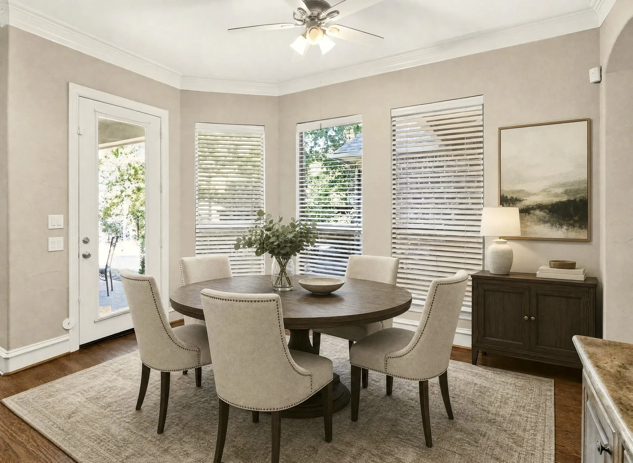 Virtually staged breakfast area overlooks the water view.