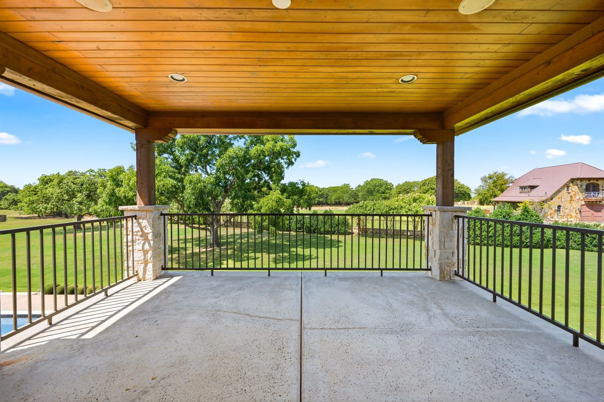 An elevated outdoor retreat with peaceful views of the surrounding grounds.