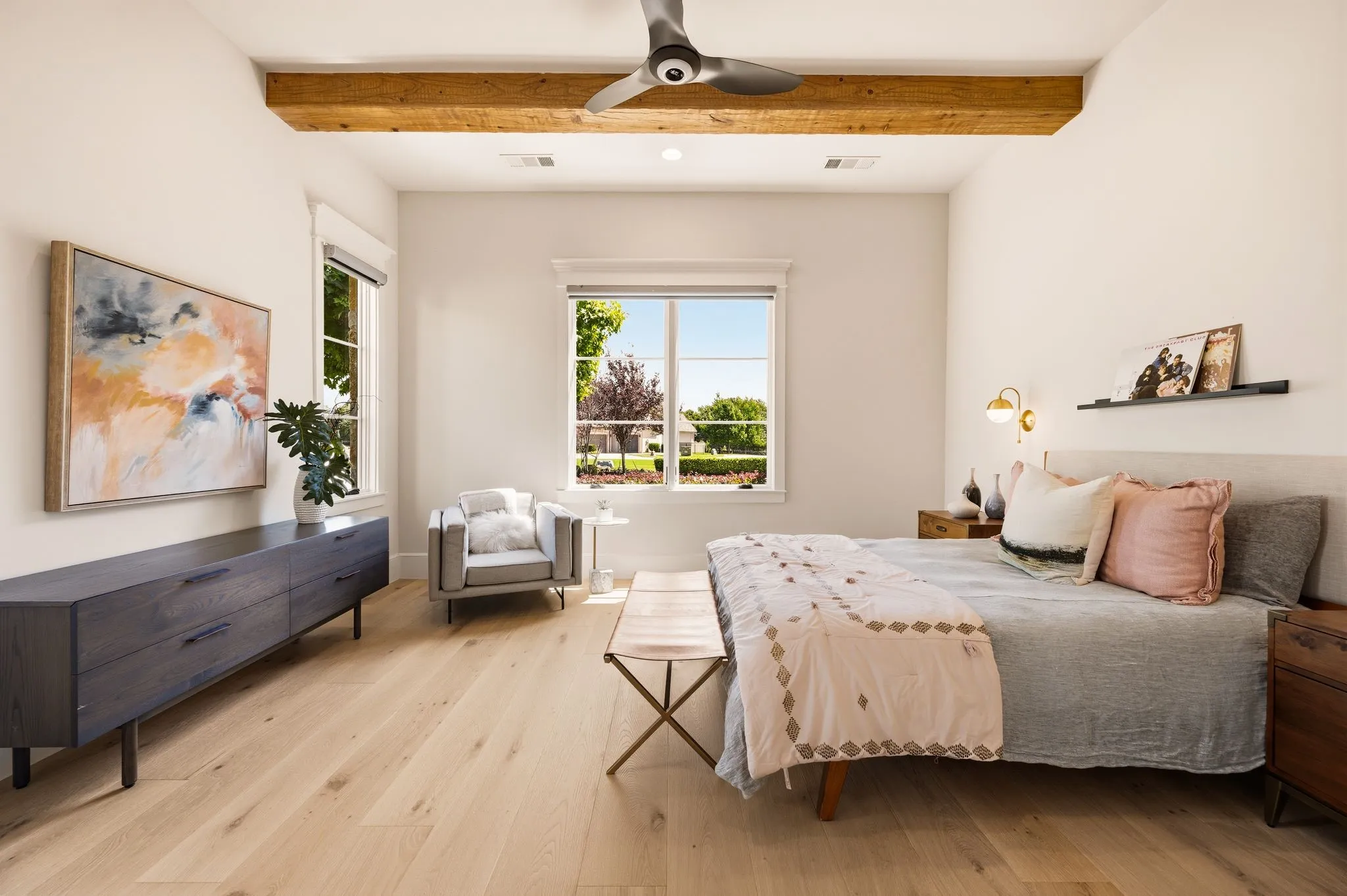 A bright, inviting bedroom with a comfortable sense of retreat.