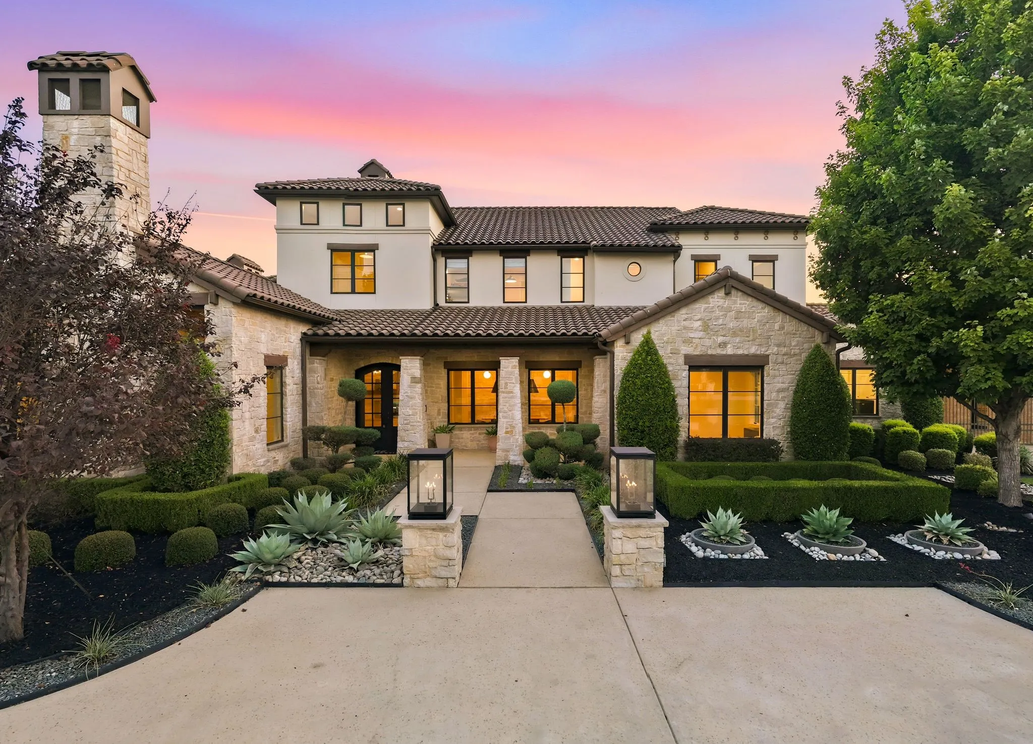 Timeless architecture creates a striking welcome at sunset.