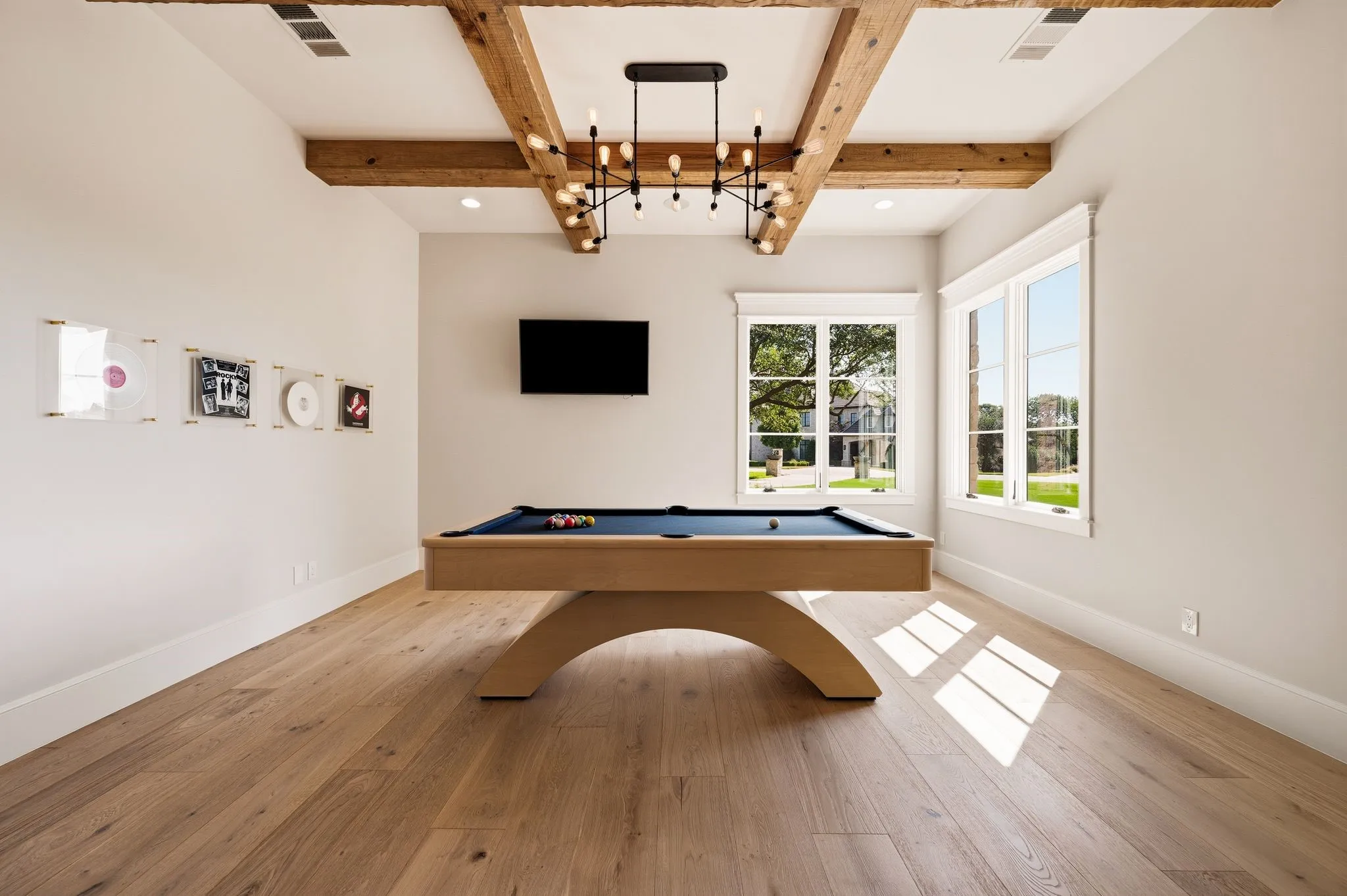 A spacious flex room invites recreation, relaxation, and entertaining.