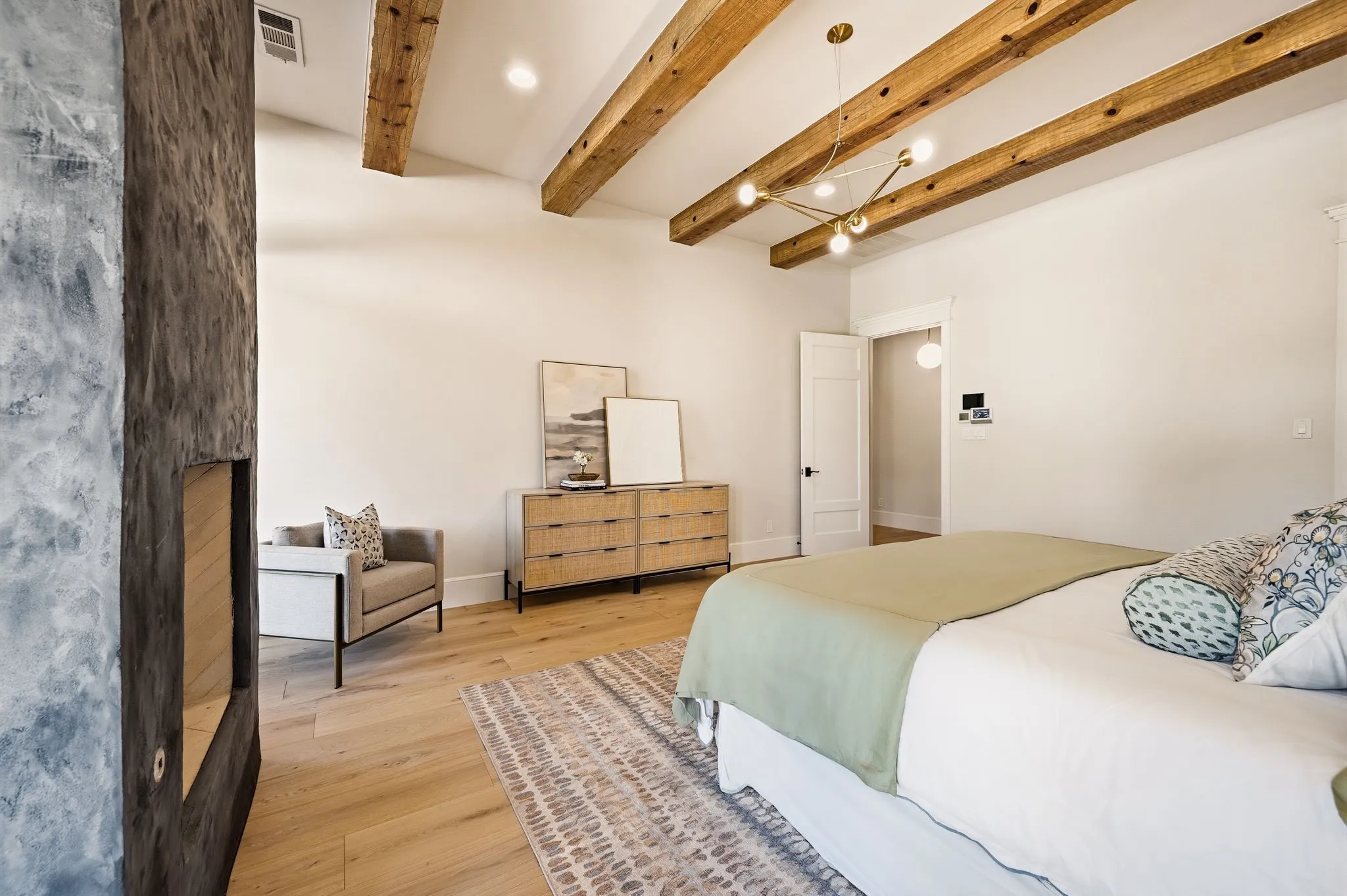 The primary suite is comfortable and cozy.