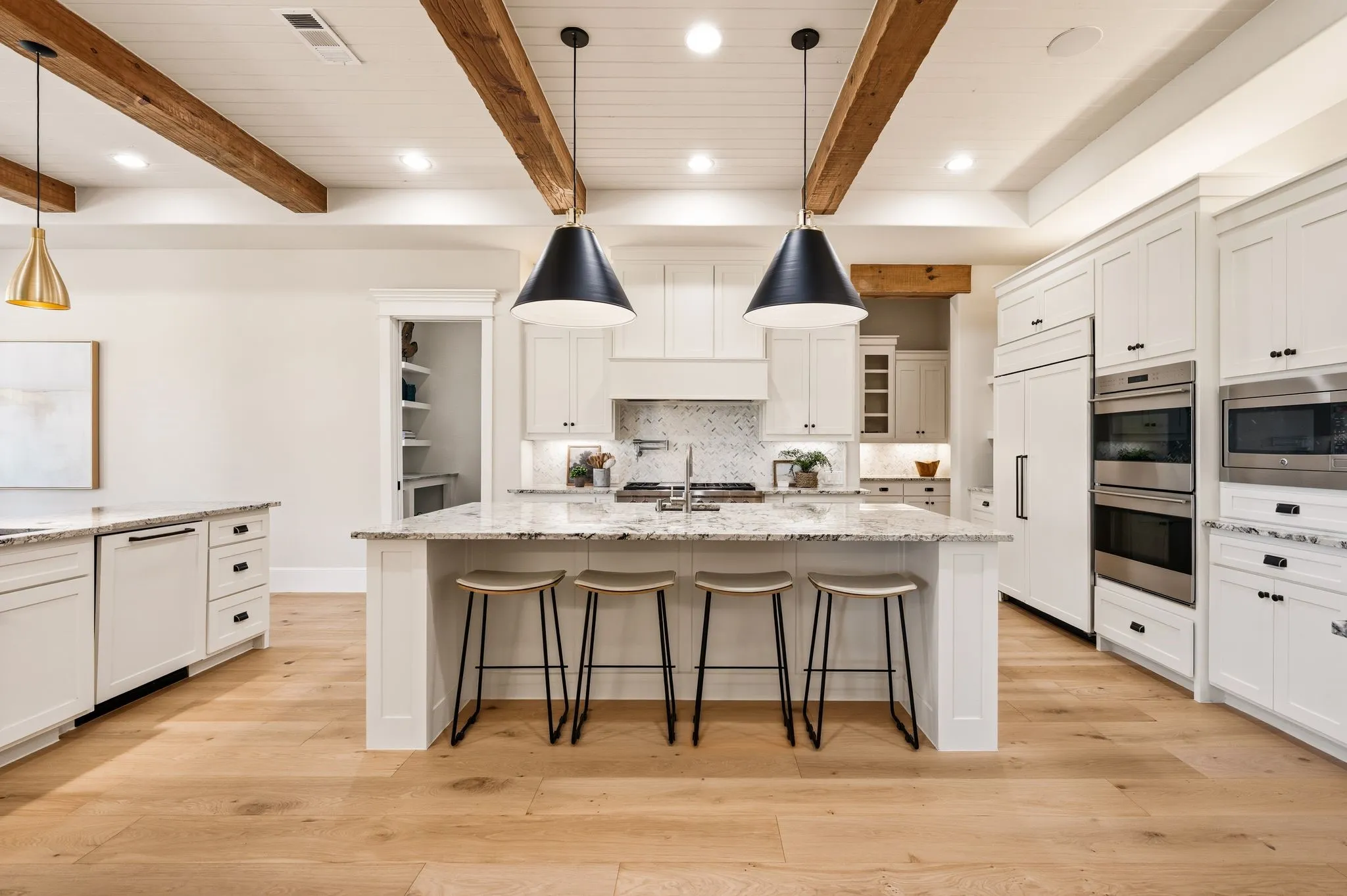 A statement kitchen designed for cooking, conversation, and entertaining.