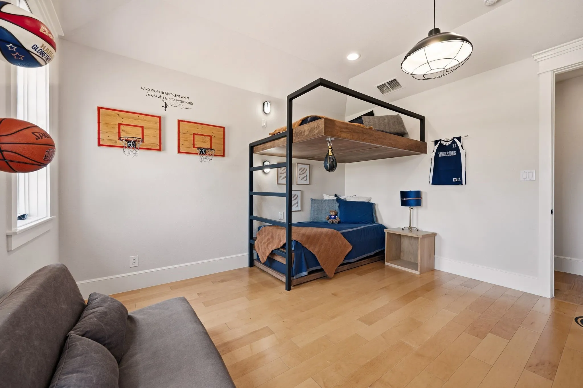 Custom built-in bunks add character and maximize this inviting bedroom.