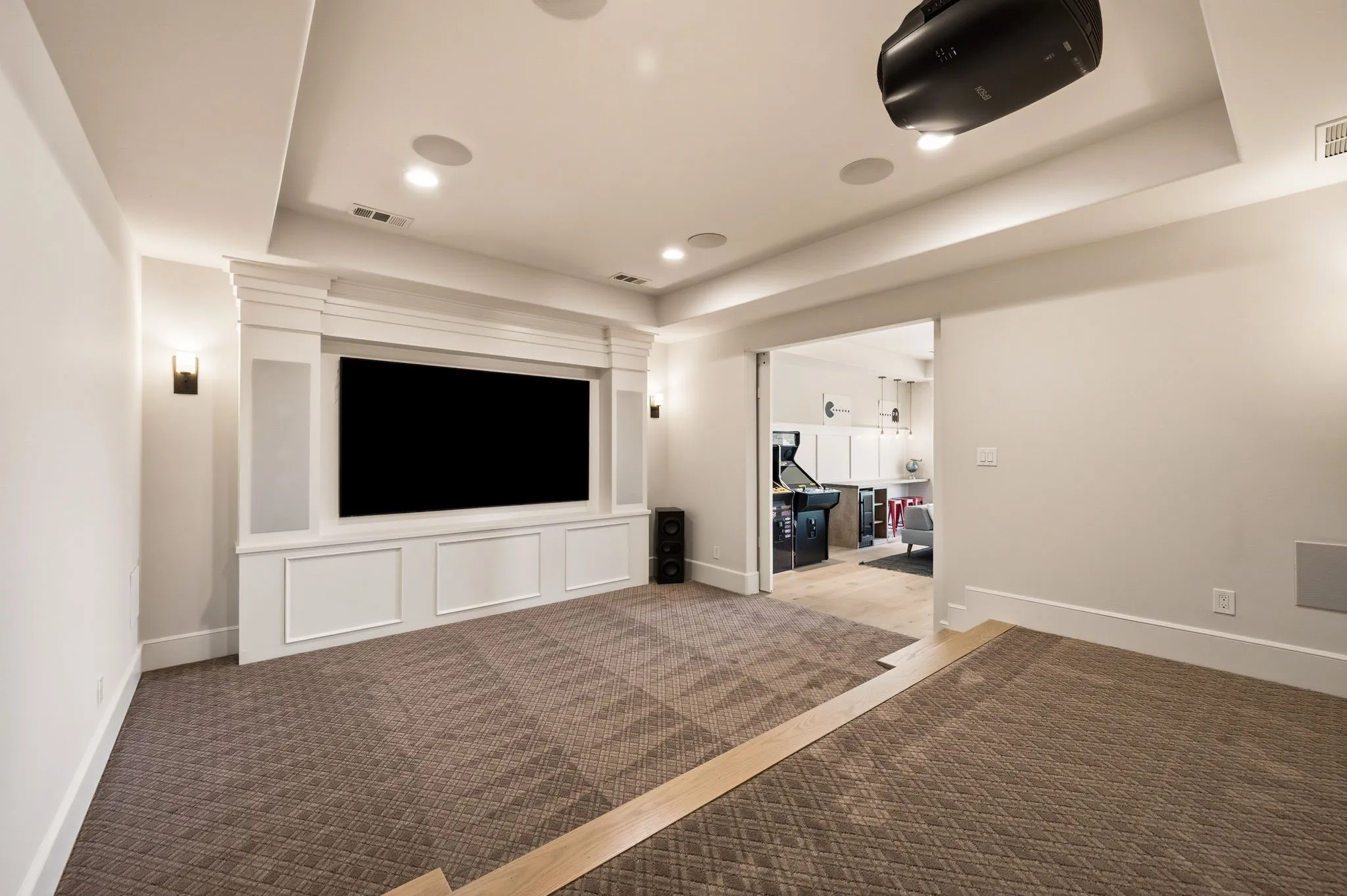 A spacious entertainment retreat designed for a true theater experience.