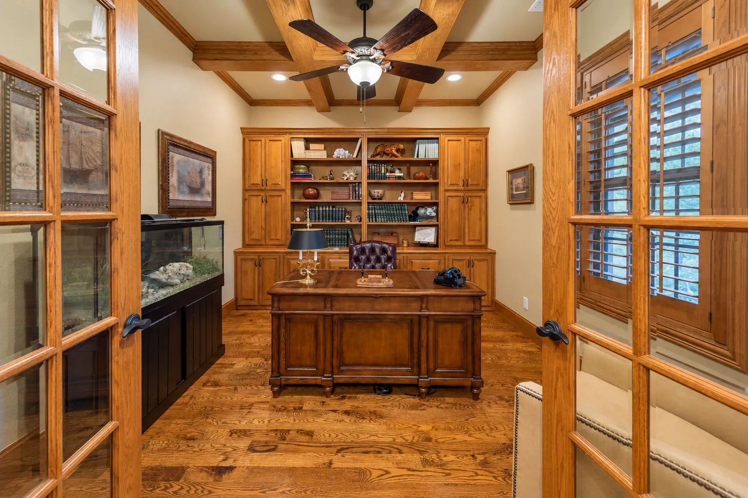 Entering the front of the home, there is a dedicated office with built-ins to the right.