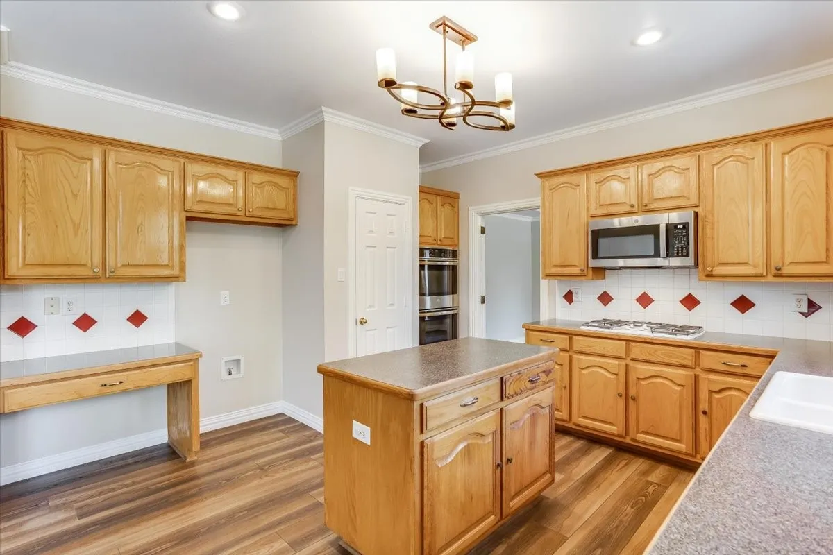 with desk and solid wood cabinets