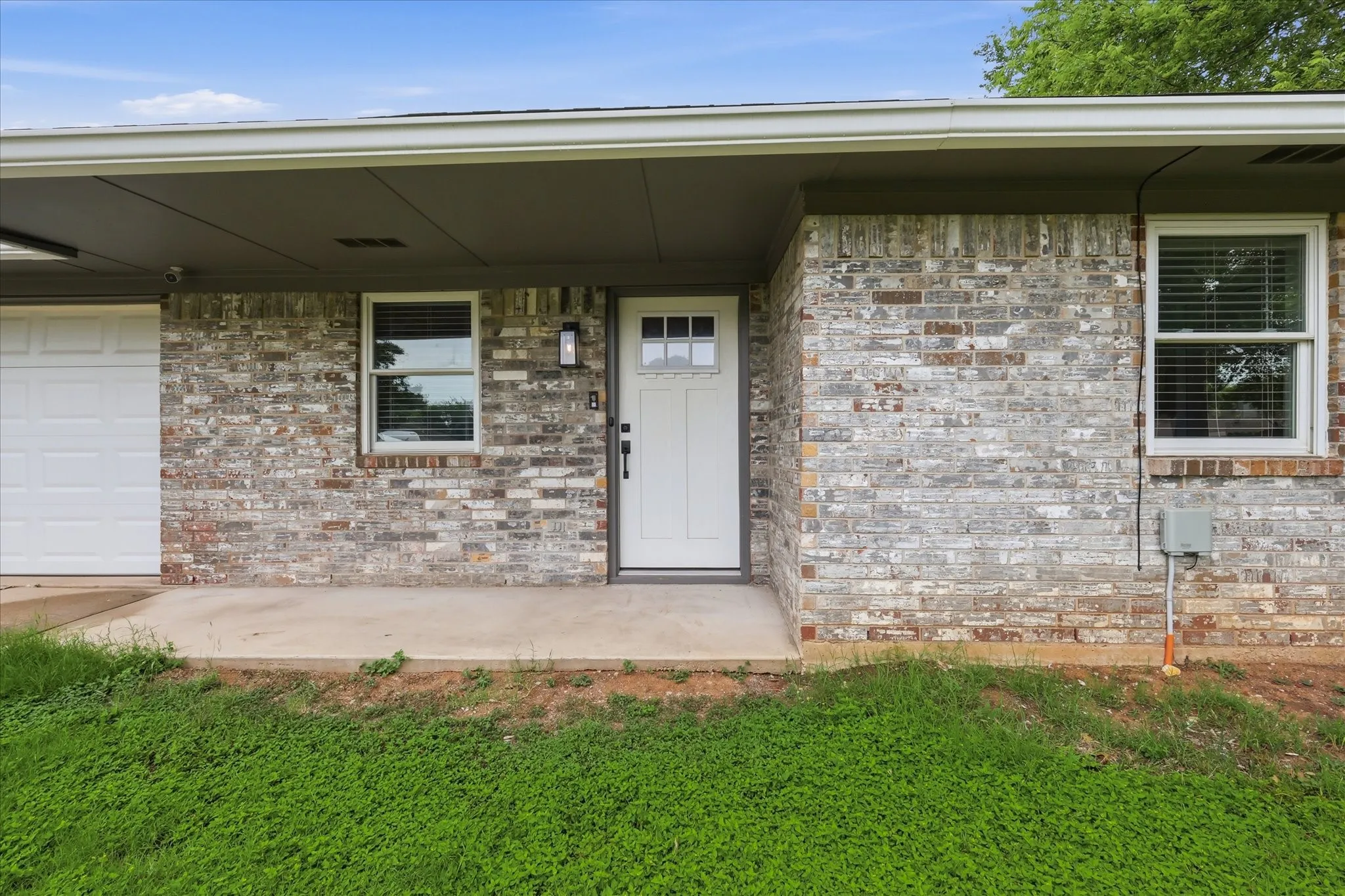Brick exterior with an integrated garage door