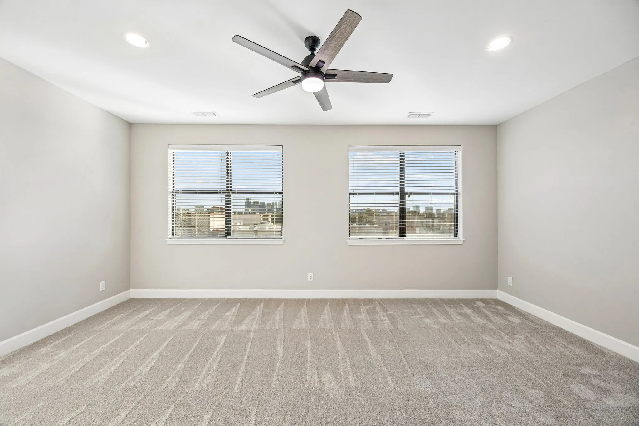 Primary bedroom with unobstructed skyline view.