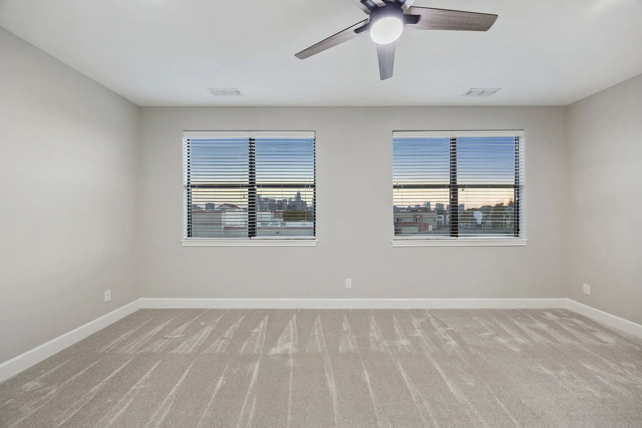 Primary bedroom with unobstructed skyline view.