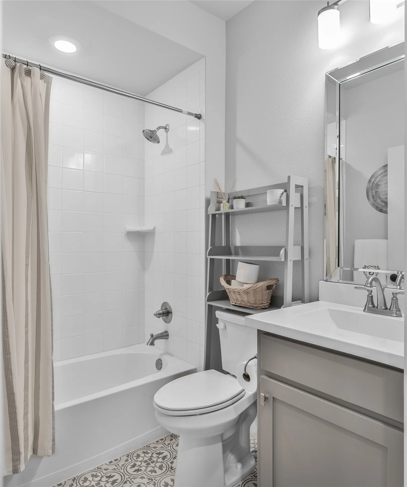 White subway tile shower surround with a built-in shelf
