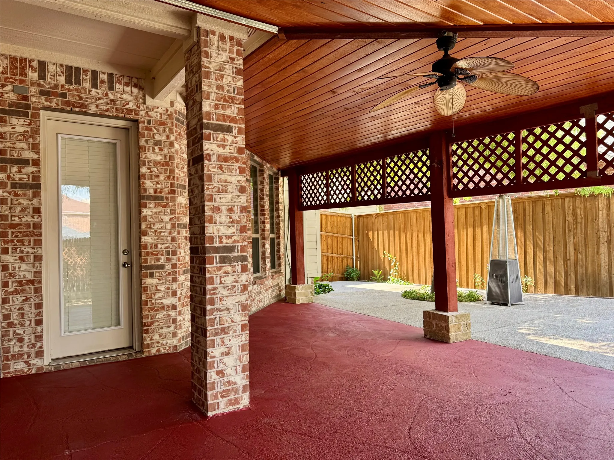 View of patio with a ceiling fan