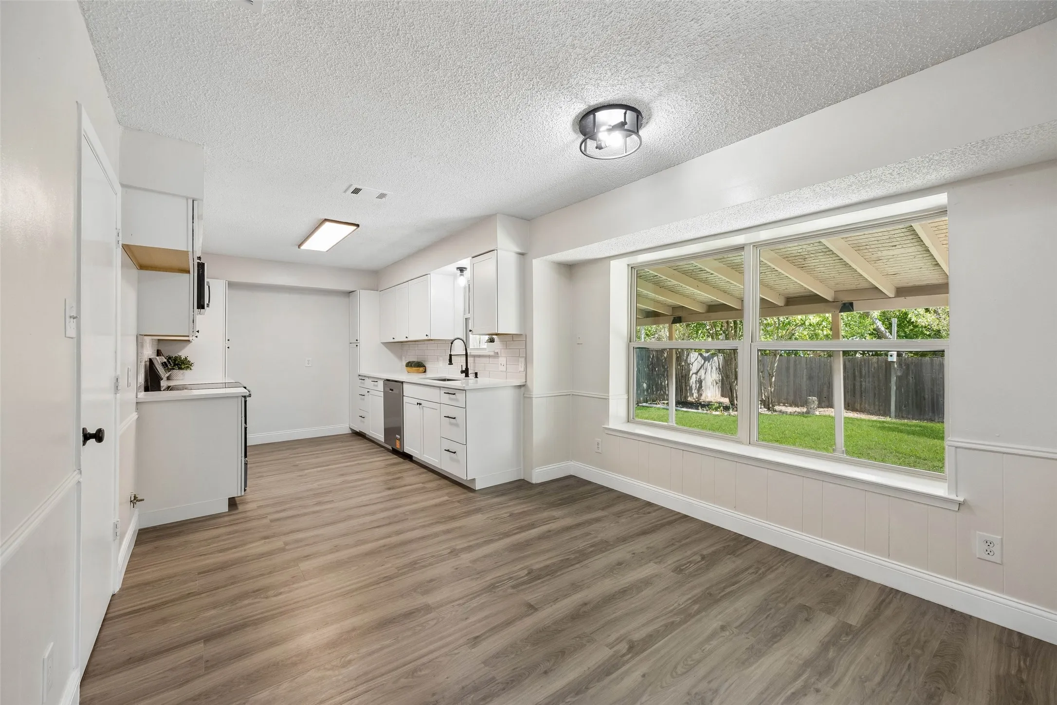 Wood-finish flooring throughout