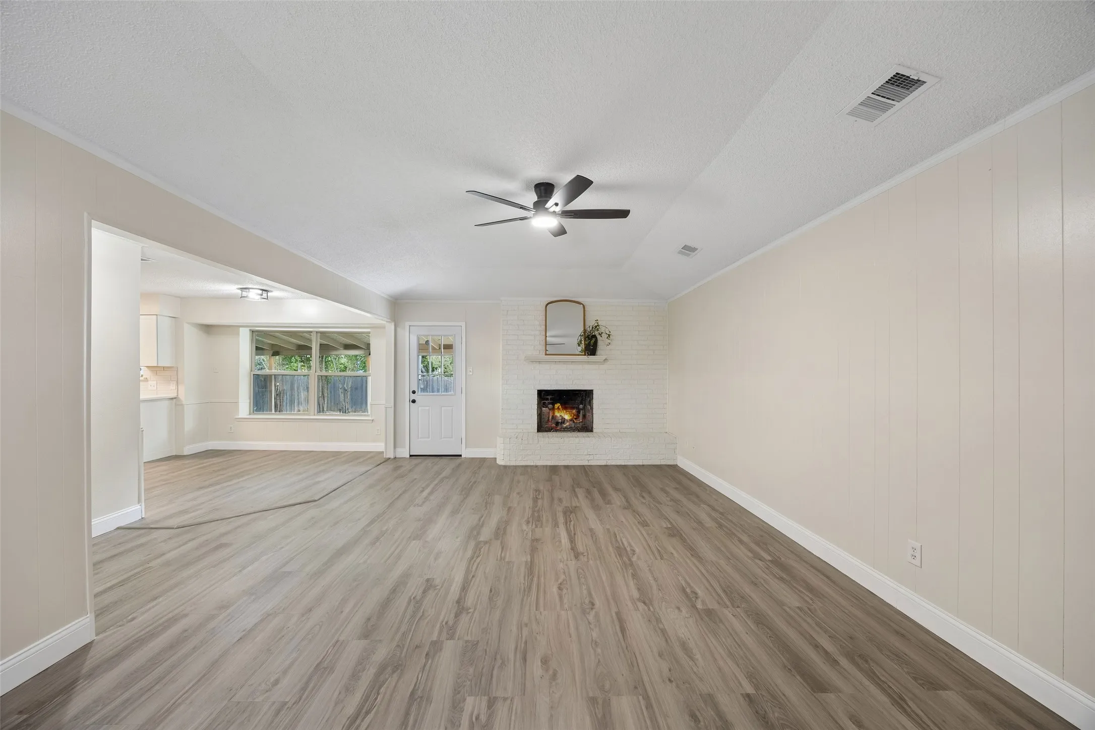 Luxury vinyl plank throughout main living areas.
