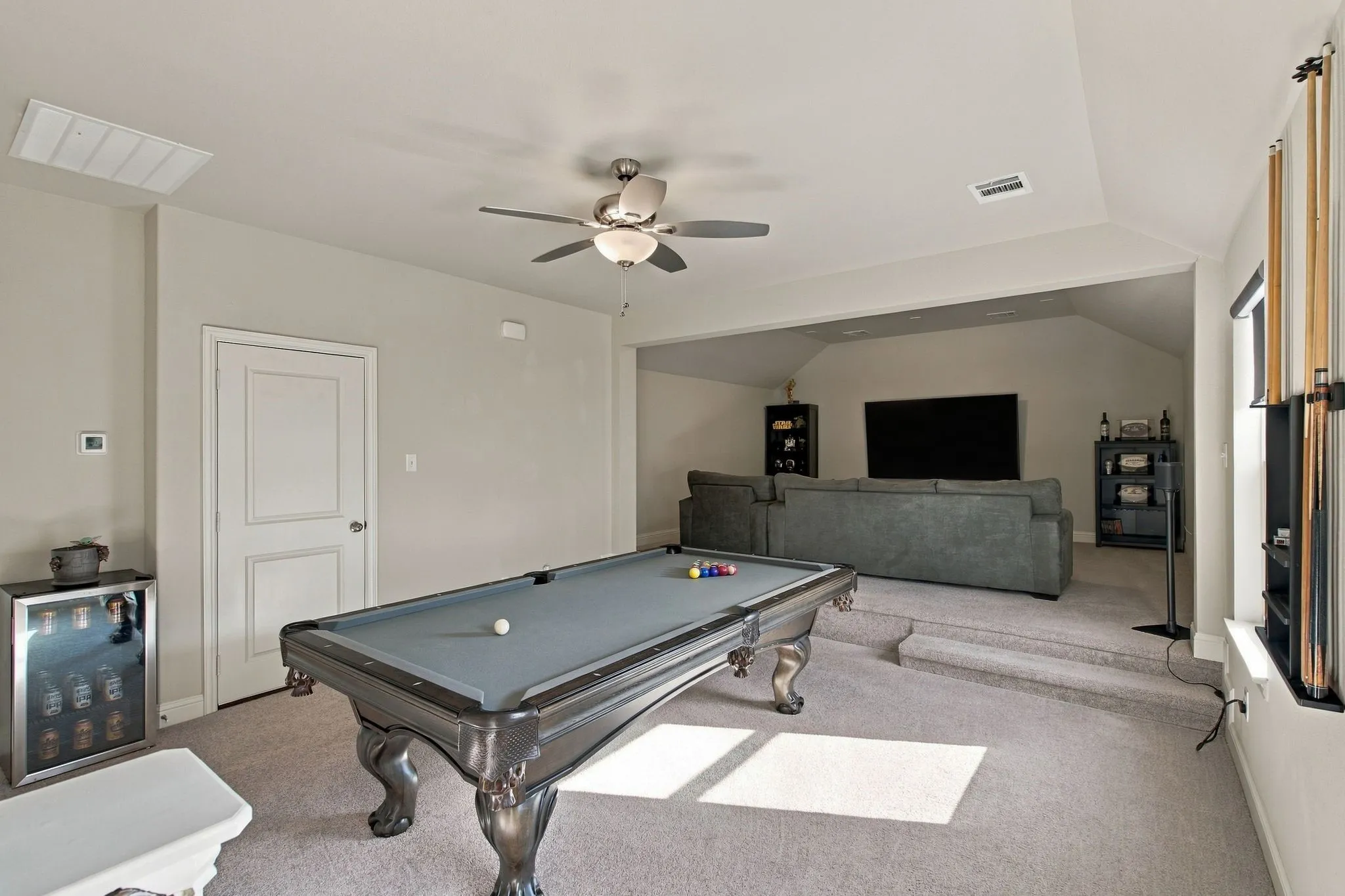Upstairs game room and media area.